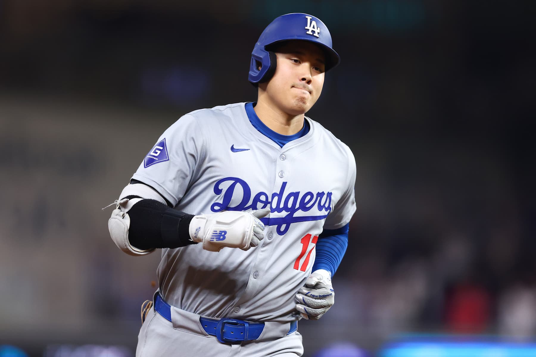 MIAMI, FLORIDA - SEPTEMBER 19: Shohei Ohtani #17 of the Los Angeles Dodgers runs the bases after hitting a two-run home run, his 50th of the season, becoming the first player with a 50/50 season in MLB history, during the seventh inning against the Miami Marlins at loanDepot park on September 19, 2024 in Miami, Florida. (Photo by Megan Briggs/Getty Images)