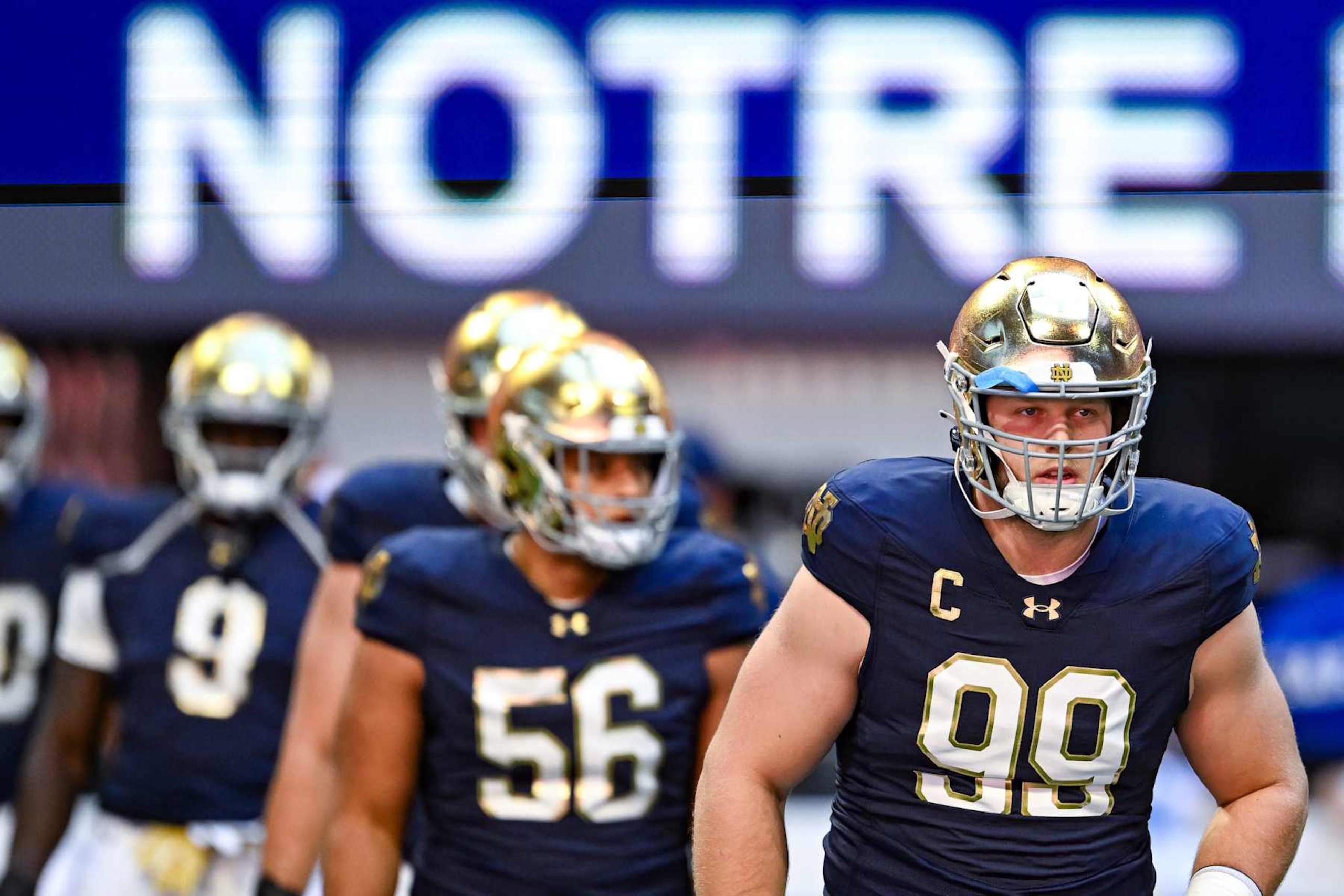 ATLANTA, GA  OCTOBER 05:  Notre Dame defensive lineman Rylie Mills (99) and teammates warm up prior to the start of the college football game between the Notre Dame Fighting Irish and the Georgia Tech Yellow Jackets on October 19th, 2024 at Mercedes-Benz Stadium in Atlanta, GA.  (Photo by Rich von Biberstein/Icon Sportswire via Getty Images)