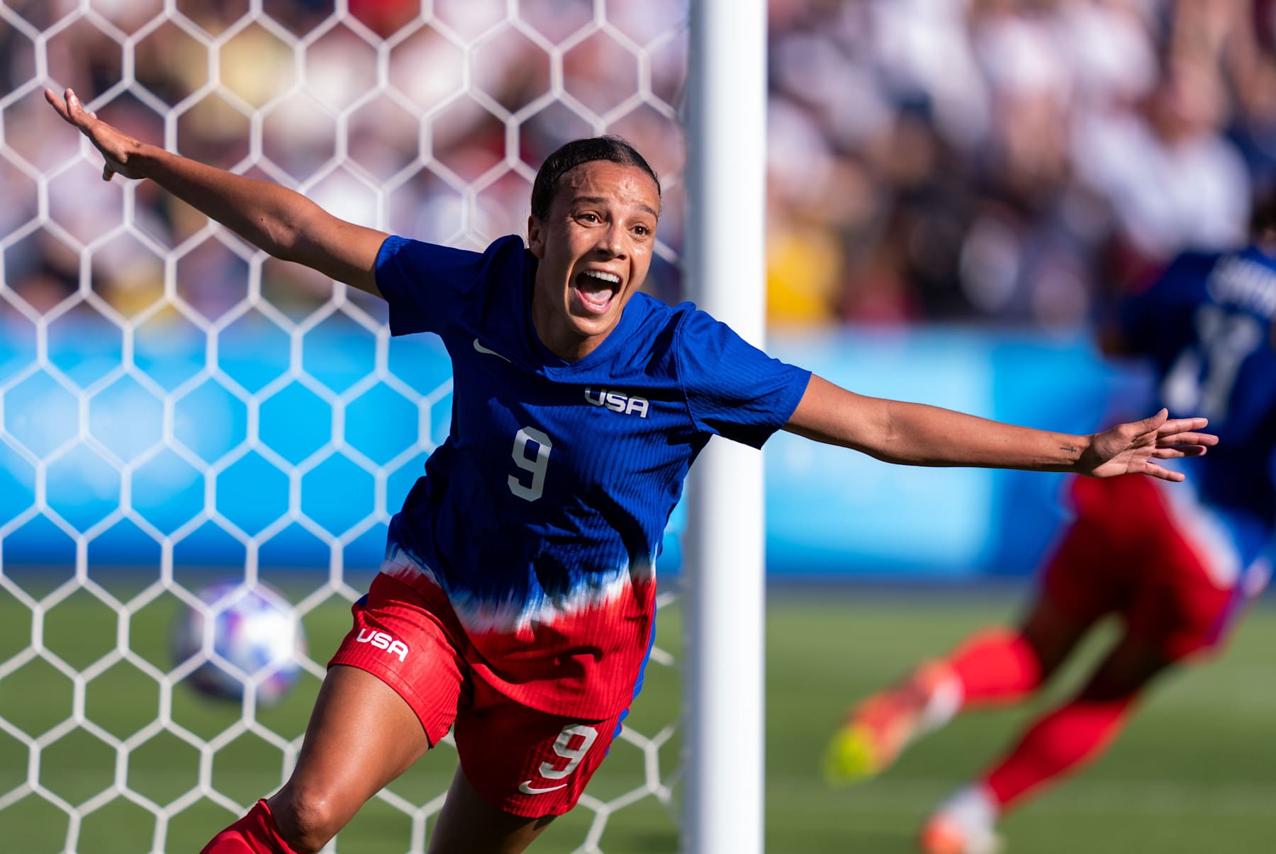 PARIS, FRANCE - AUGUST 10: Mallory Swanson #9 of the United States celebrates her game winning goal during the Women's Gold Medal match during the Olympic Games Paris 2024 at Parc des Princes on August 10, 2024 in Paris, France. (Photo by Brad Smith/ISI/Getty Images)
