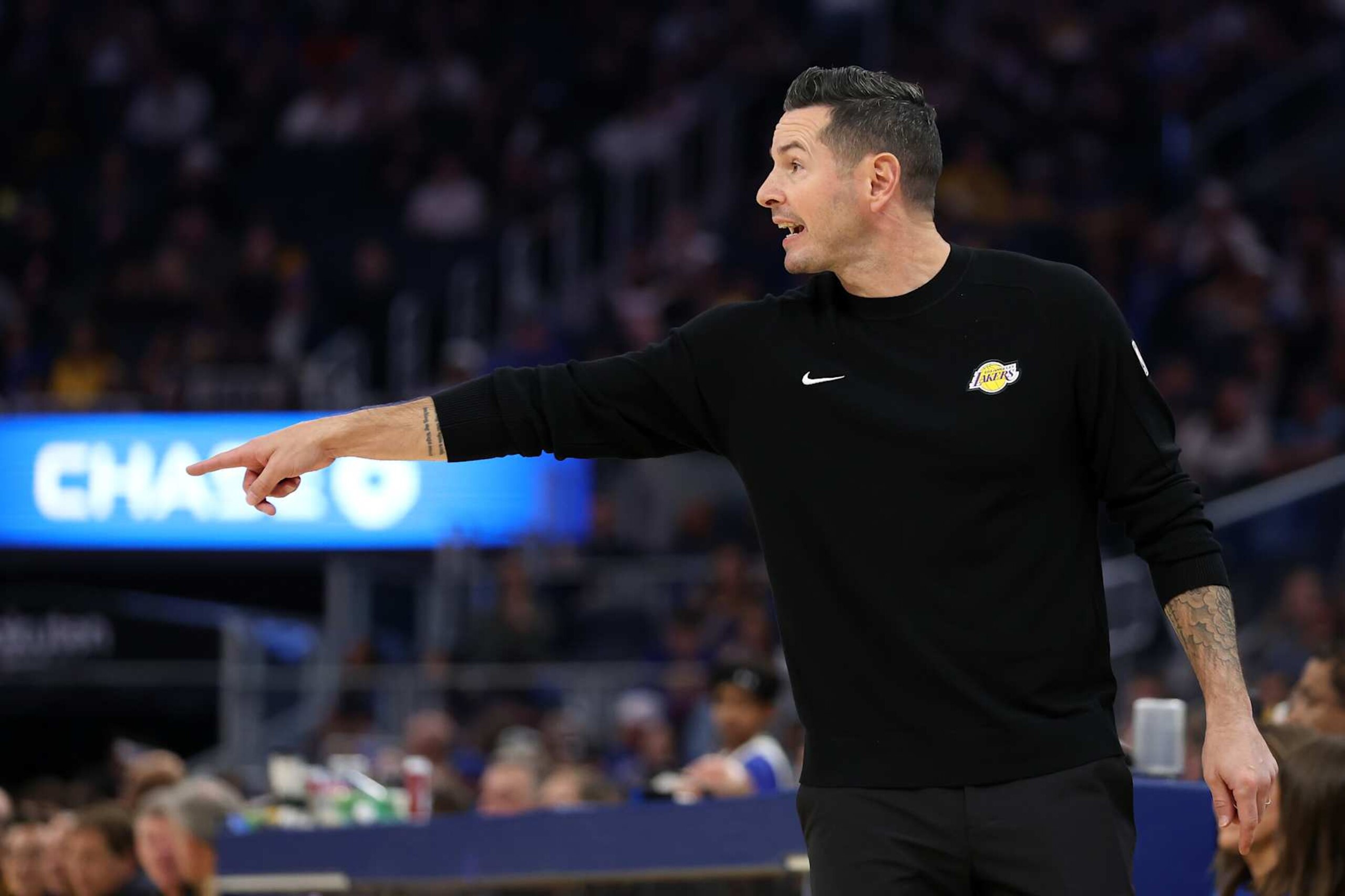 SAN FRANCISCO, CALIFORNIA - OCTOBER 18: Los Angeles Lakers head coach JJ Redick talks to his team during the first half of their preseason game against the Golden State Warriors at Chase Center on October 18, 2024 in San Francisco, California. NOTE TO USER: User expressly acknowledges and agrees that, by downloading and/or using this photograph, user is consenting to the terms and conditions of the Getty Images License Agreement. (Photo by Ezra Shaw/Getty Images) SAN FRANCISCO, CALIFORNIA - OCTOBER 18: Los Angeles Lakers head coach JJ Redick talks to his team during the first half of their preseason game against the Golden State Warriors at Chase Center on October 18, 2024 in San Francisco, California. NOTE TO USER: User expressly acknowledges and agrees that, by downloading and/or using this photograph, user is consenting to the terms and conditions of the Getty Images License Agreement. (Photo by Ezra Shaw/Getty Images)