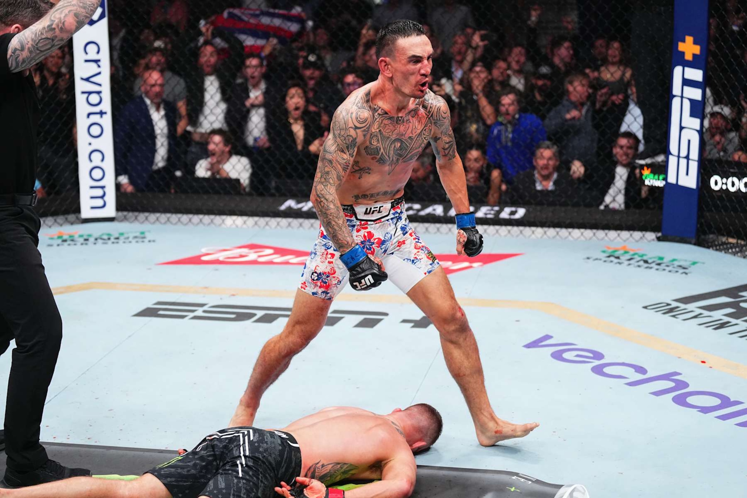 Max Holloway reacts to his knockout of Justin Gaethje