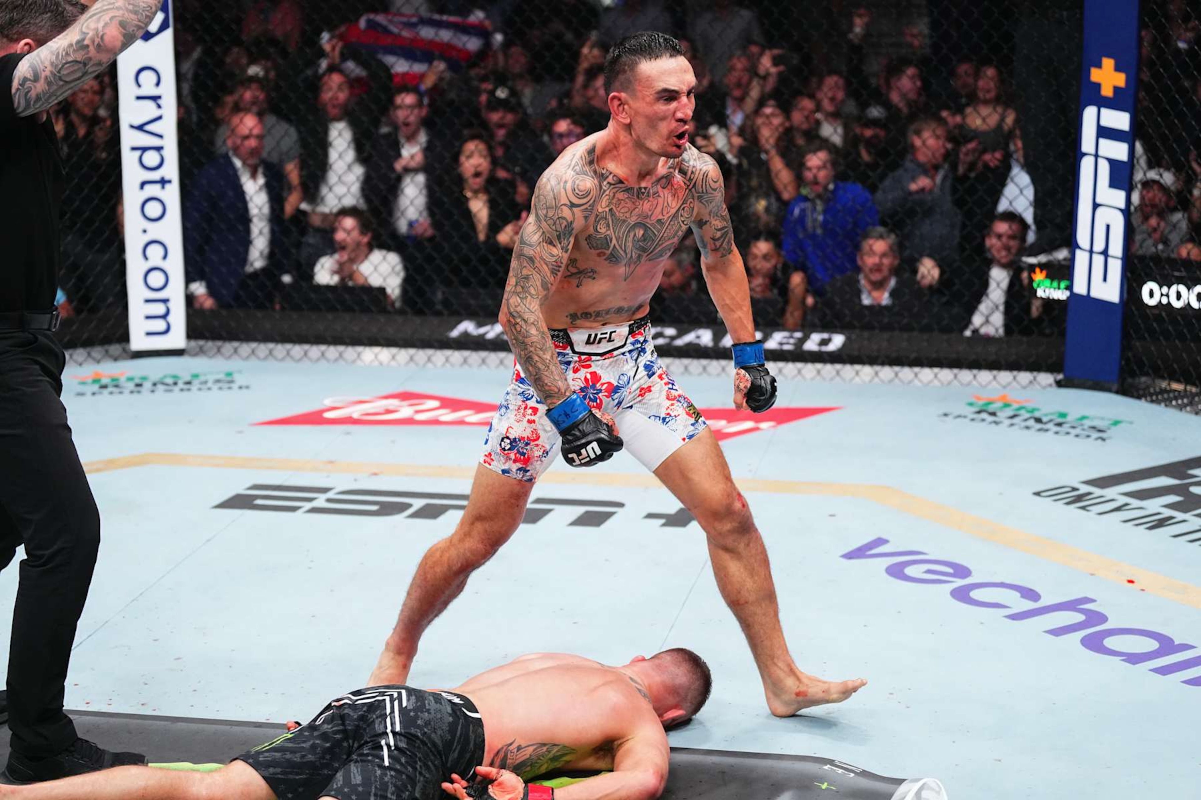 Max Holloway reacts to his knockout of Justin Gaethje