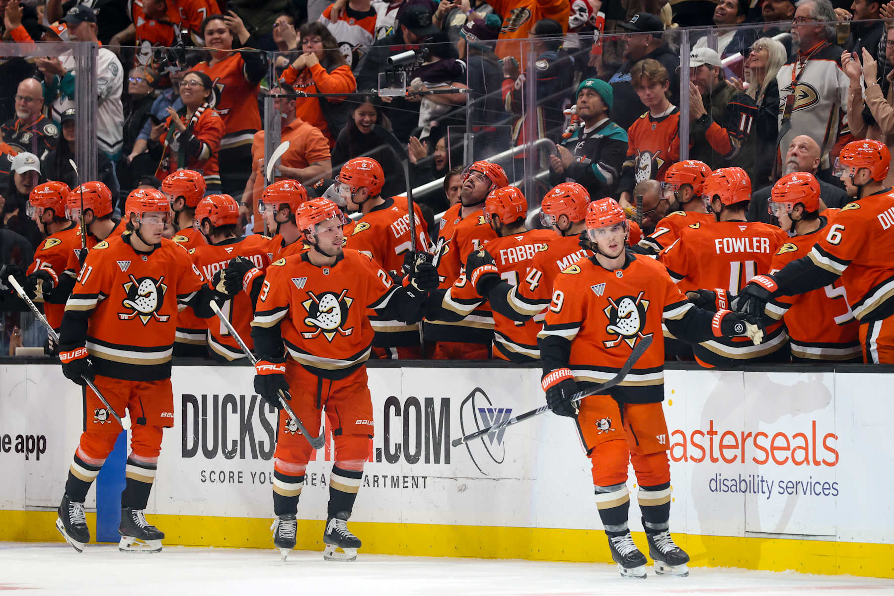 ANAHEIM, CA - OCTOBER 22: Troy Terry #19 of the Anaheim Ducks celebrates his goal with teammates during the second period against the San Jose Sharks at Honda Center on October 22, 2024 in Anaheim, California. (Photo by Debora Robinson/NHLI via Getty Images)