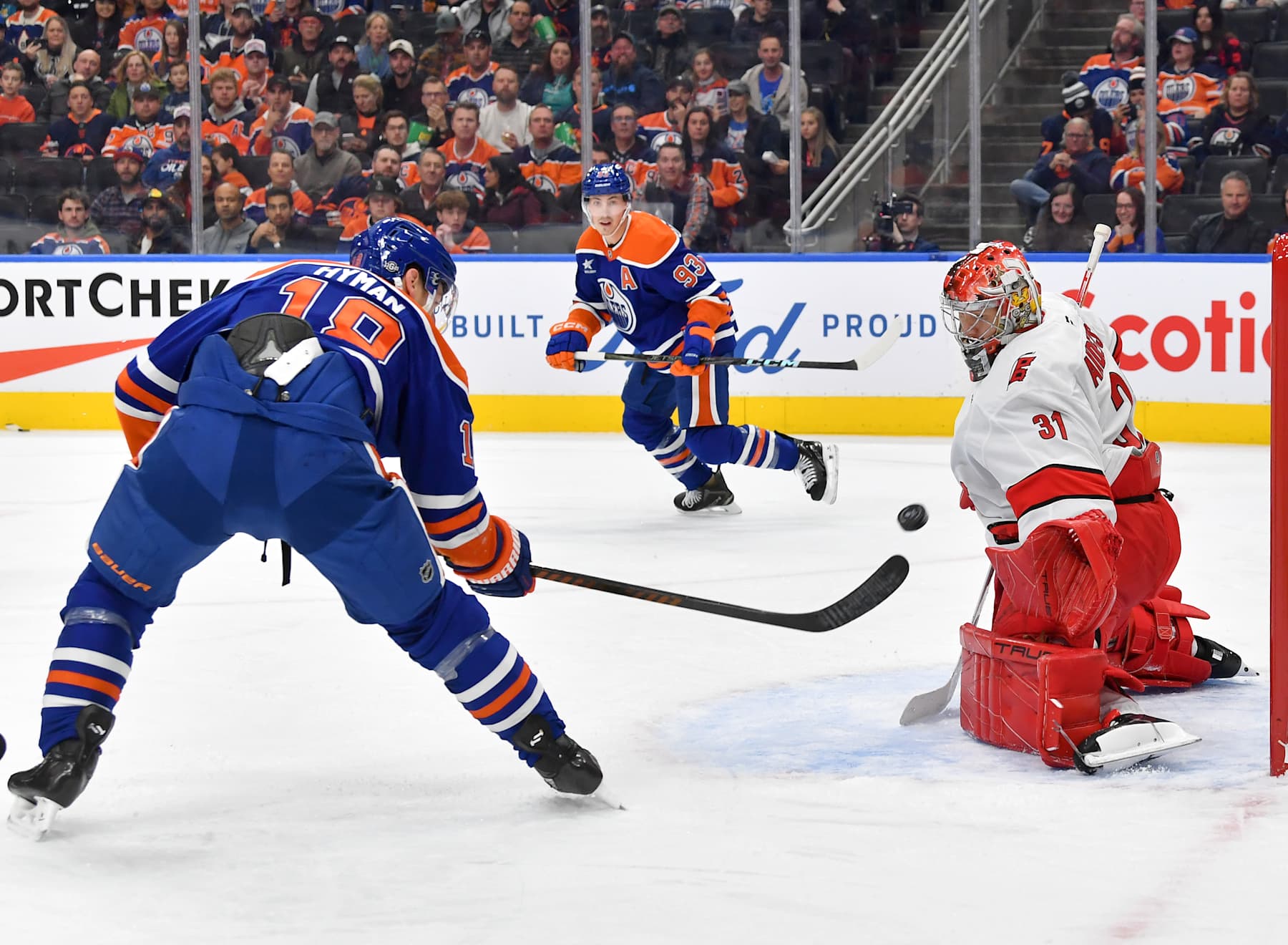EDMONTON, CANADA - OCTOBER 22: Frederik Andersen #31 of the Carolina Hurricanes makes a save against Zach Hyman #18 of the Edmonton Oilers during the game at Rogers Place on October 22, 2024, in Edmonton, Alberta, Canada. (Photo by Andy Devlin/NHLI via Getty Images)