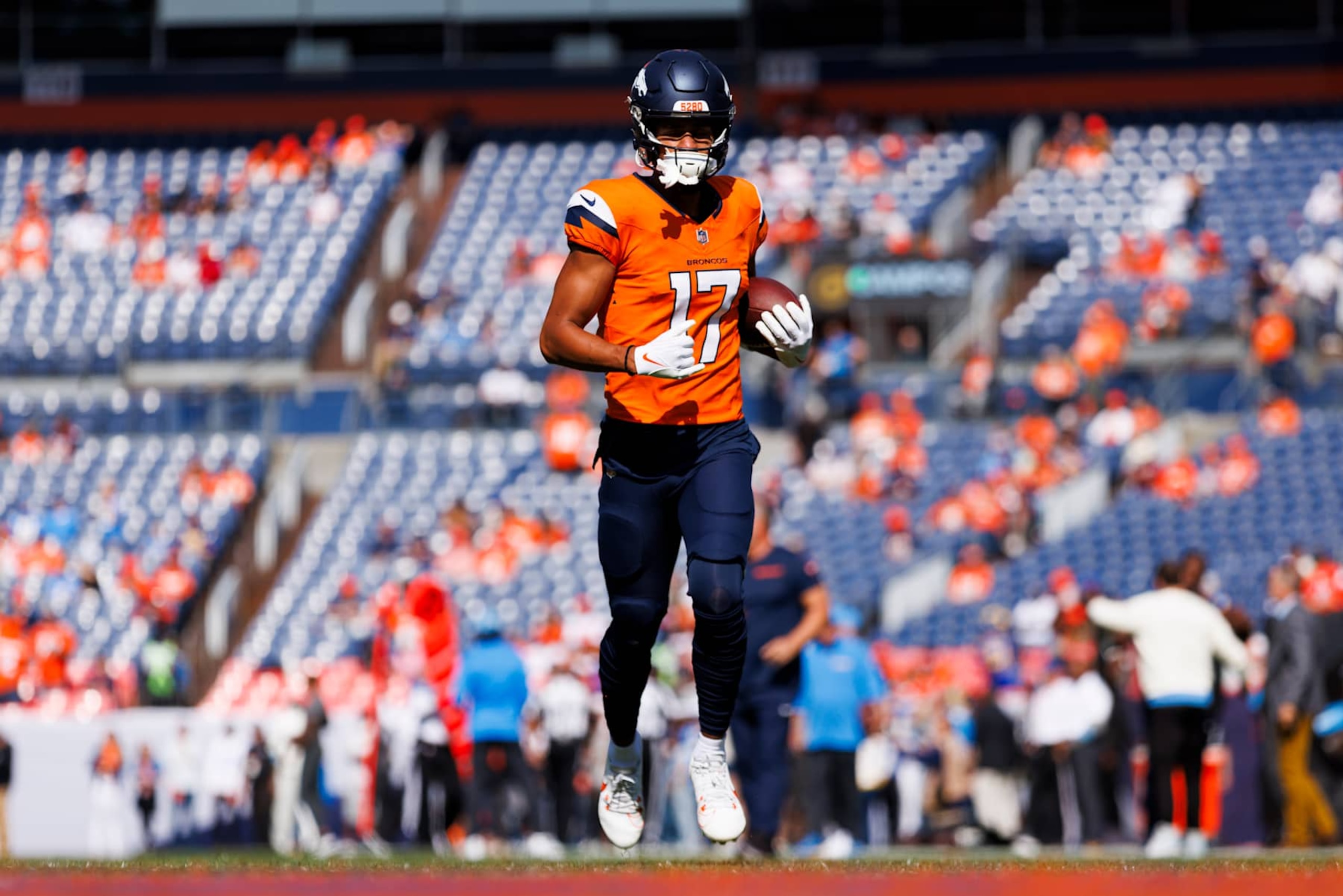 DENVER, COLORADO - OCTOBER 13: Devaughn Vele #17 of the Denver Broncos runs after the catch during the first half against the Los Angeles Chargers at Empower Field At Mile High on October 13, 2024 in Denver, Colorado. (Photo by Ric Tapia/Getty Images)