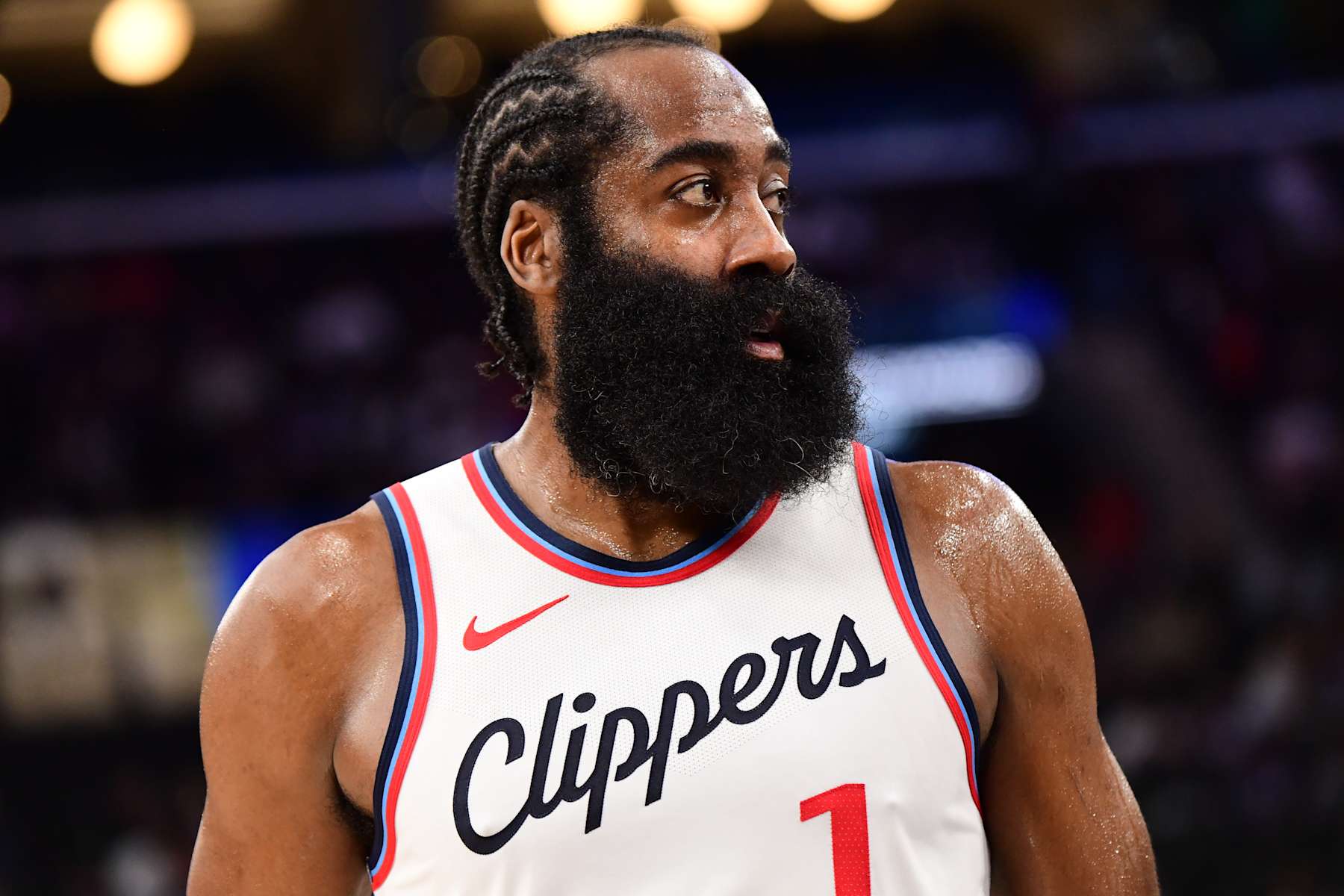 INGLEWOOD, CA - OCTOBER 14: James Harden #1 of the LA Clippers looks on during the game against the Dallas Mavericks during a NBA Preseason game on October 14, 2024 at the Intuit Dome in Inglewood, California. NOTE TO USER: User expressly acknowledges and agrees that, by downloading and/or using this Photograph, user is consenting to the terms and conditions of the Getty Images License Agreement. Mandatory Copyright Notice: Copyright 2024 NBAE (Photo by Adam Pantozzi/NBAE via Getty Images)