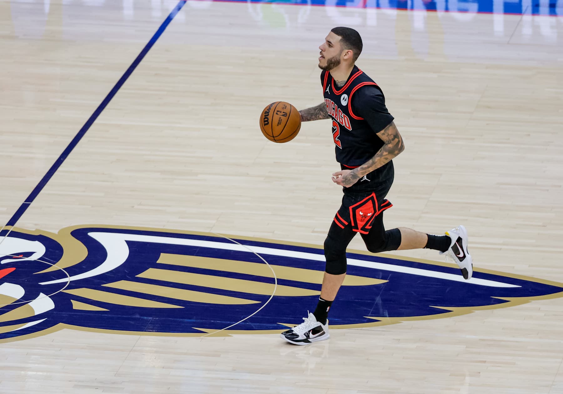 NEW ORLEANS, LOUISIANA - OCTOBER 23:  Lonzo Ball #2 of the Chicago Bulls plays against the New Orleans Pelicans during the first half of a game at the Smoothie King Center on October 23, 2024 in New Orleans, Louisiana. NOTE TO USER: User expressly acknowledges and agrees that, by downloading and or using this photograph, User is consenting to the terms and conditions of the Getty Images License Agreement. (Photo by Derick E. Hingle/Getty Images)