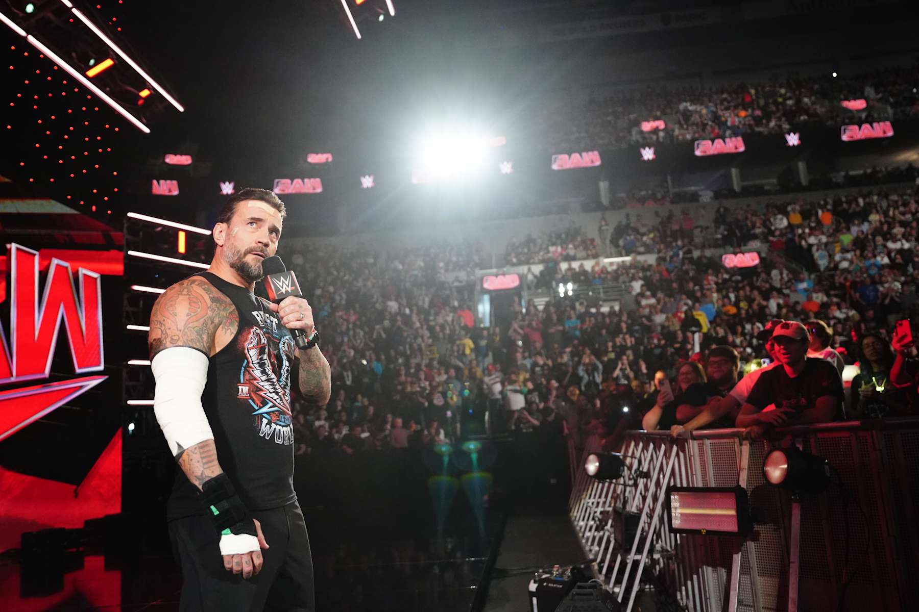 ST LOUIS, MISSOURI - OCTOBER 07: CM Punk addresses the crowd during Monday Night RAW at Enterprise Center on October 7, 2024 in St Louis, Missouri. (Photo by WWE/Getty Images)