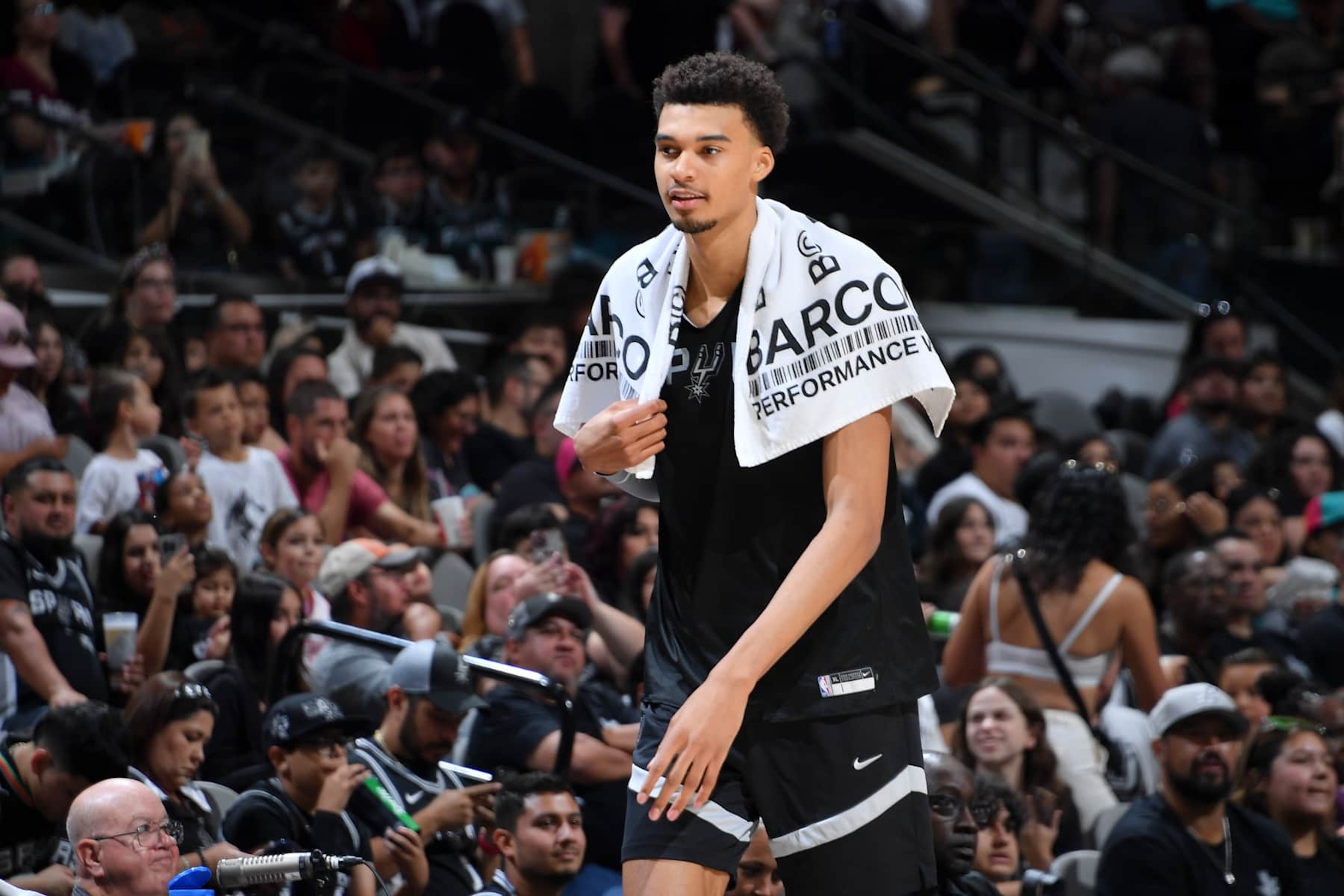 San Antonio TX, - October 19, 2024: Victor Wembanyama #1 looks on during the Spurs Open Scrimmage on October 19, 2024 at the Frost Bank Center in San Antonio Texas. NOTE TO USER: User expressly acknowledges and agrees that, by downloading and or using this photograph, user is consenting to the terms and conditions of the Getty Images License Agreement. Mandatory Copyright Notice: Copyright 2024 NBAE (Photos by Michael Gonzales/NBAE via Getty Images)