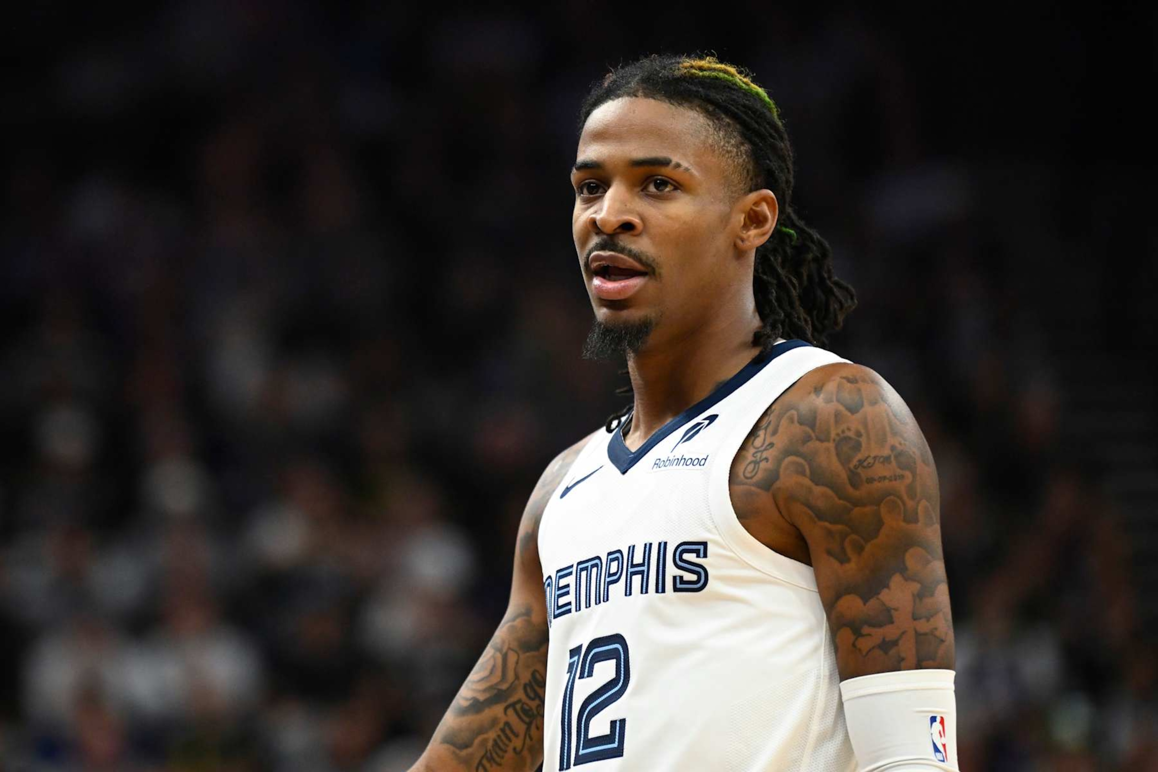 SALT LAKE CITY, UTAH - OCTOBER 23: Ja Morant #12 of the Memphis Grizzlies reacts during the first quarter of the game against the Utah Jazz at Delta Center on October 23, 2024 in Salt Lake City, Utah. NOTE TO USER: User expressly acknowledges and agrees that, by downloading and or using this photograph, User is consenting to the terms and conditions of the Getty Images License Agreement. (Photo by Alex Goodlett/Getty Images)