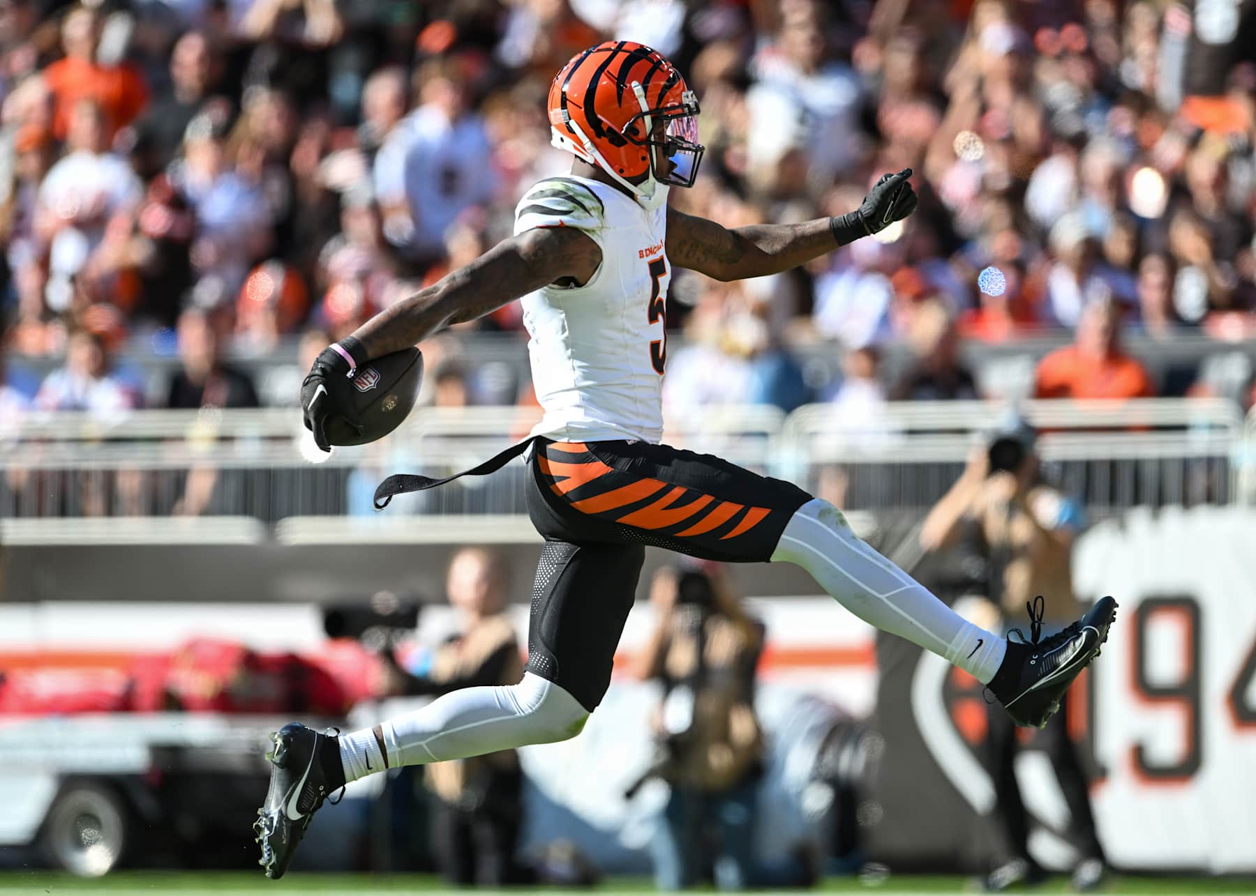 CLEVELAND, OHIO - OCTOBER 20: Tee Higgins #5 of the Cincinnati Bengals runs for a touchdown in the third quarter of a game against the Cleveland Browns at Huntington Bank Field on October 20, 2024 in Cleveland, Ohio. (Photo by Nick Cammett/Getty Images)