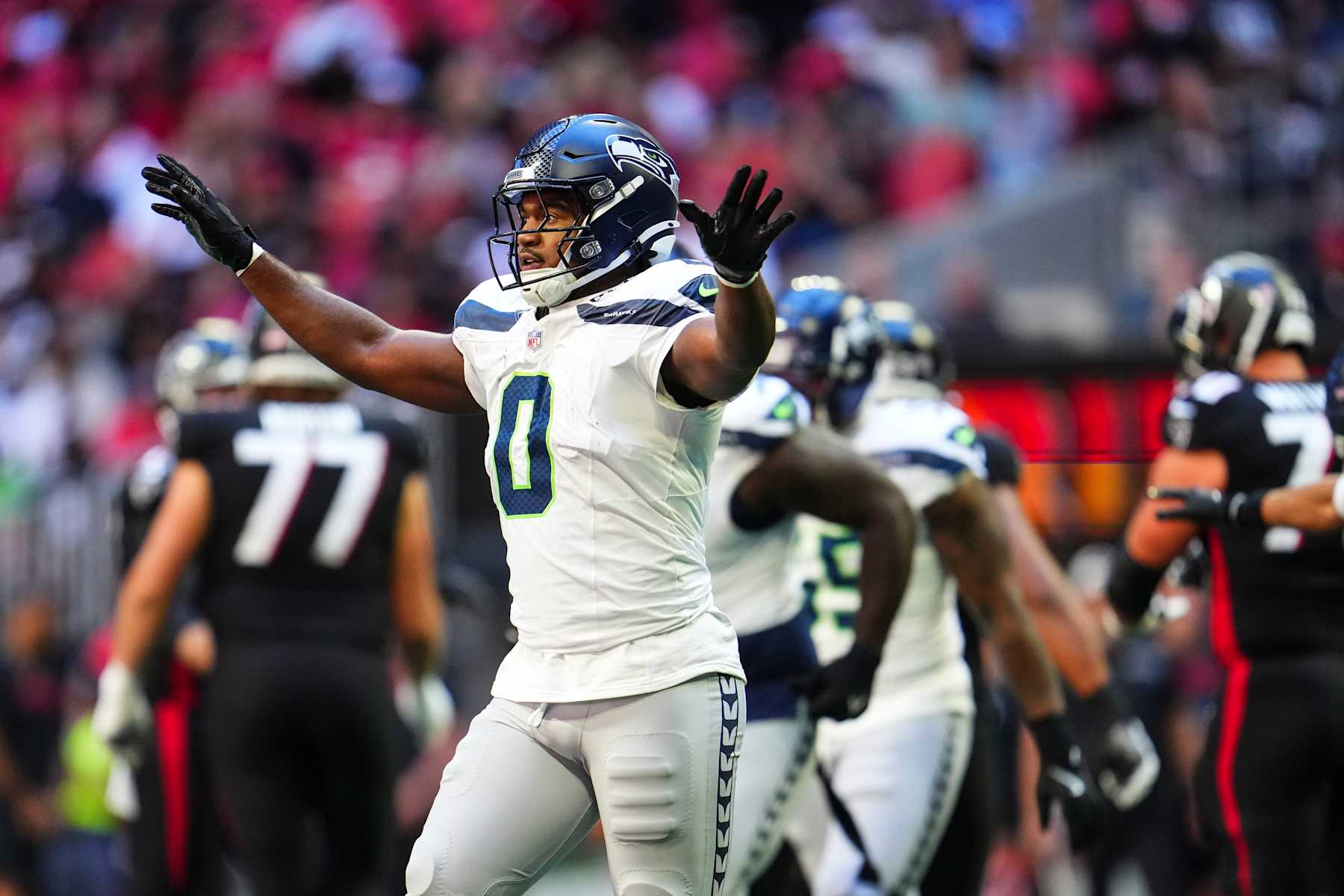 ATLANTA, GA - OCTOBER 20: Tyrel Dodson #0 of the Seattle Seahawks reacts during an NFL football game against the Atlanta Falcons at Mercedes-Benz Stadium on October 20, 2024 in Atlanta, Georgia. (Photo by Cooper Neill/Getty Images)