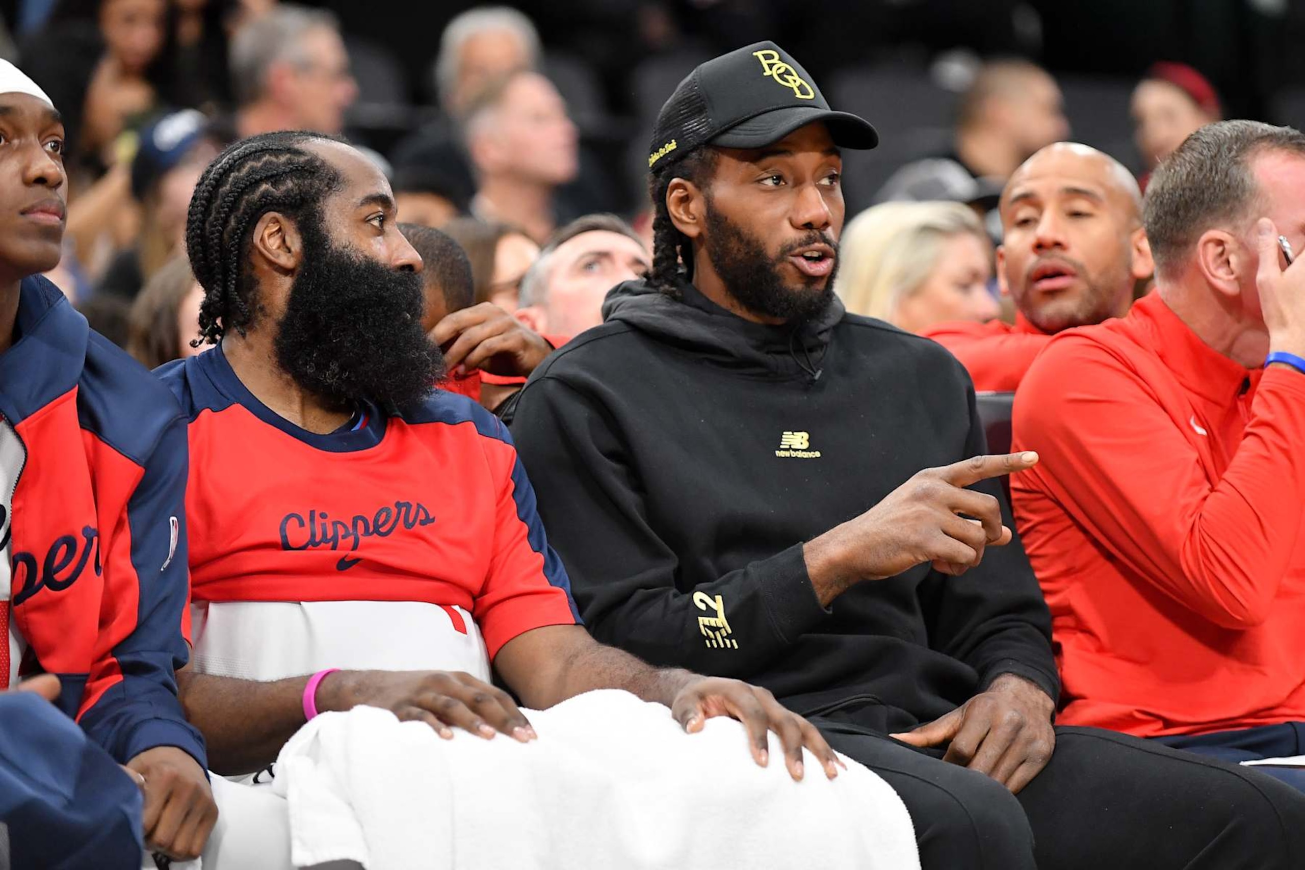 INGLEWOOD, CALIFORNIA - OCTOBER 14: James Harden (L) #1 and Kawhi Leonard #2 of the LA Clippers talk on the bench during the game against the Dallas Mavericks at Intuit Dome on October 14, 2024 in Inglewood, California. NOTE TO USER: User expressly acknowledges and agrees that, by downloading and or using this photograph, User is consenting to the terms and conditions of the Getty Images License Agreement. (Photo by Allen Berezovsky/Getty Images)