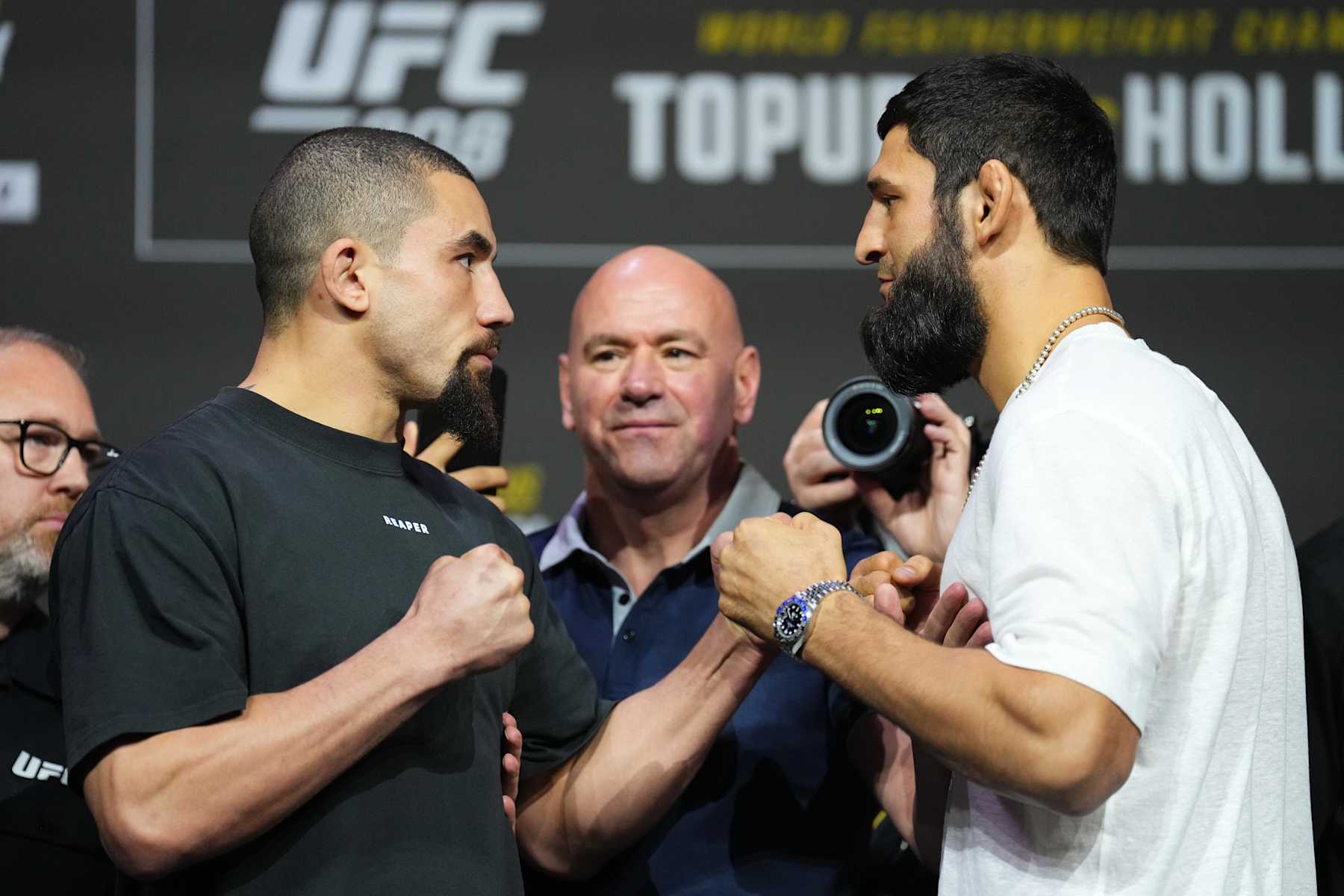 Opponents Robert Whittaker and Khamzat Chimaev face off