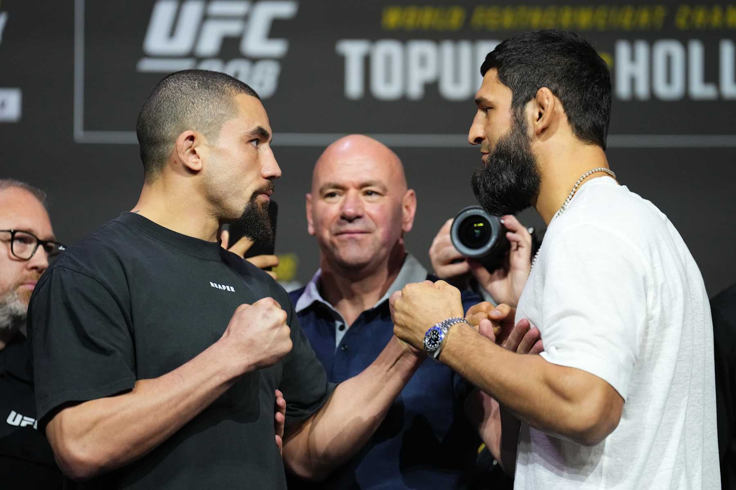 Opponents Robert Whittaker and Khamzat Chimaev face off 