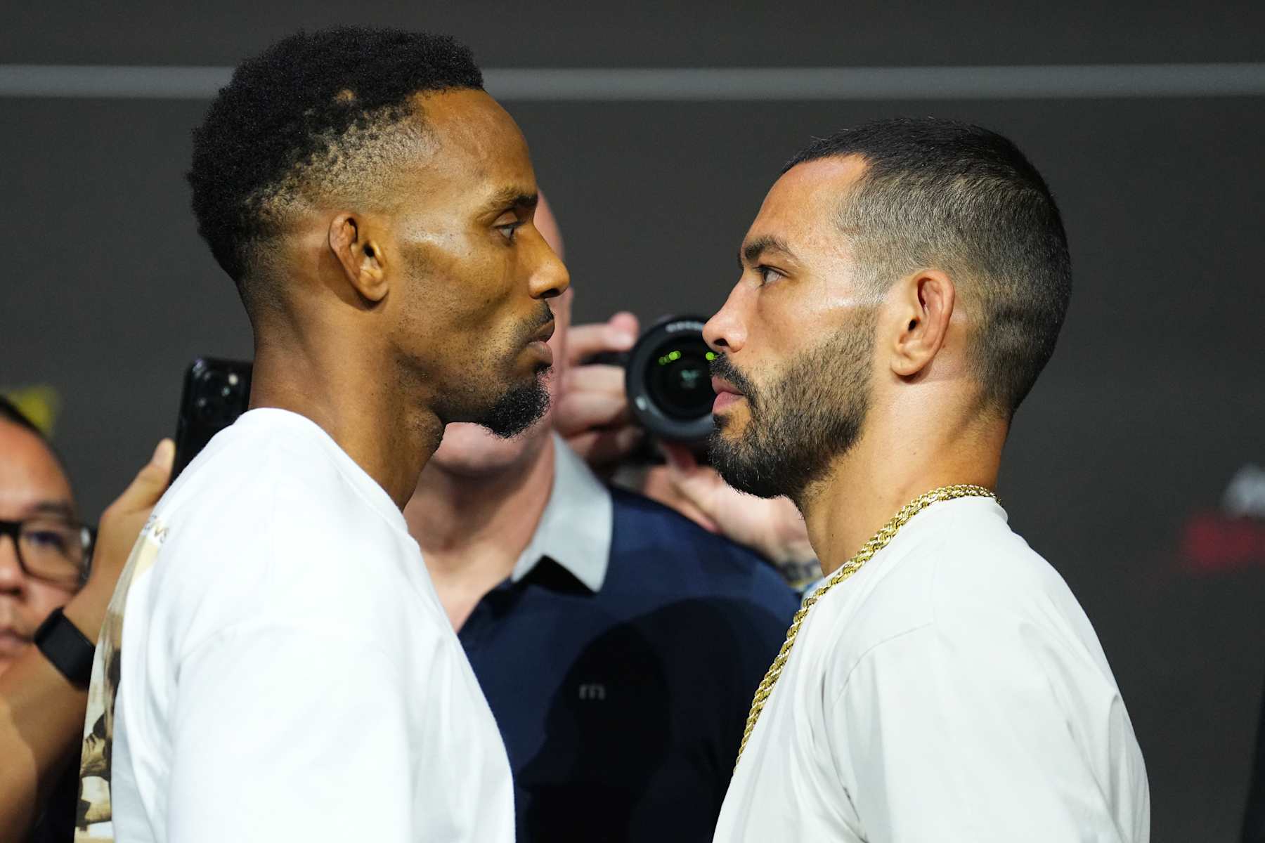 Opponents Lerone Murphy and Dan Ige face off
