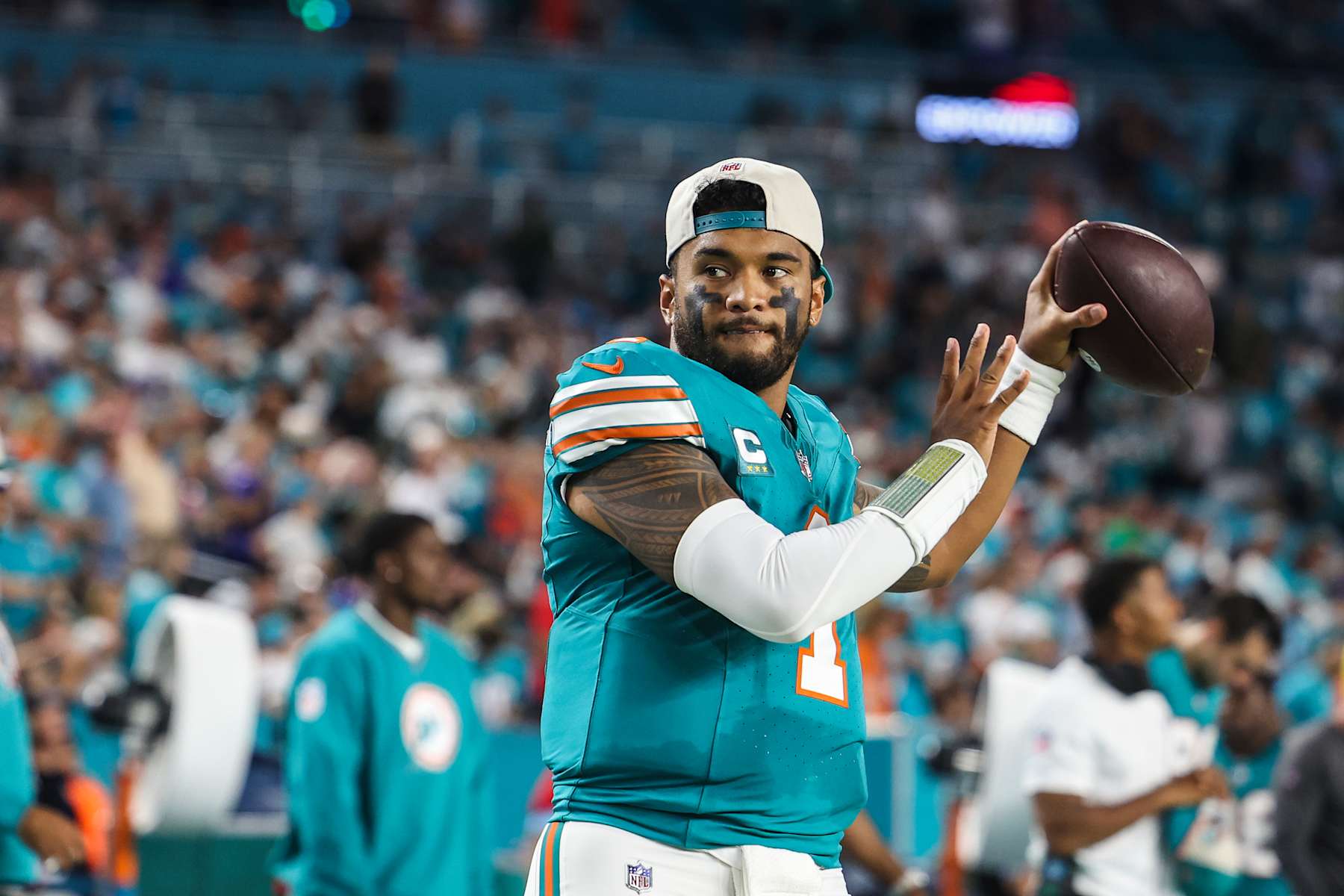 MIAMI GARDENS, FL - SEPTEMBER 12: Tua Tagovailoa #1 of the Miami Dolphins warms up prior to an NFL football game against the Buffalo Bills at Hard Rock Stadium on September 12, 2024 in Miami Gardens, FL. (Photo by Perry Knotts/Getty Images)