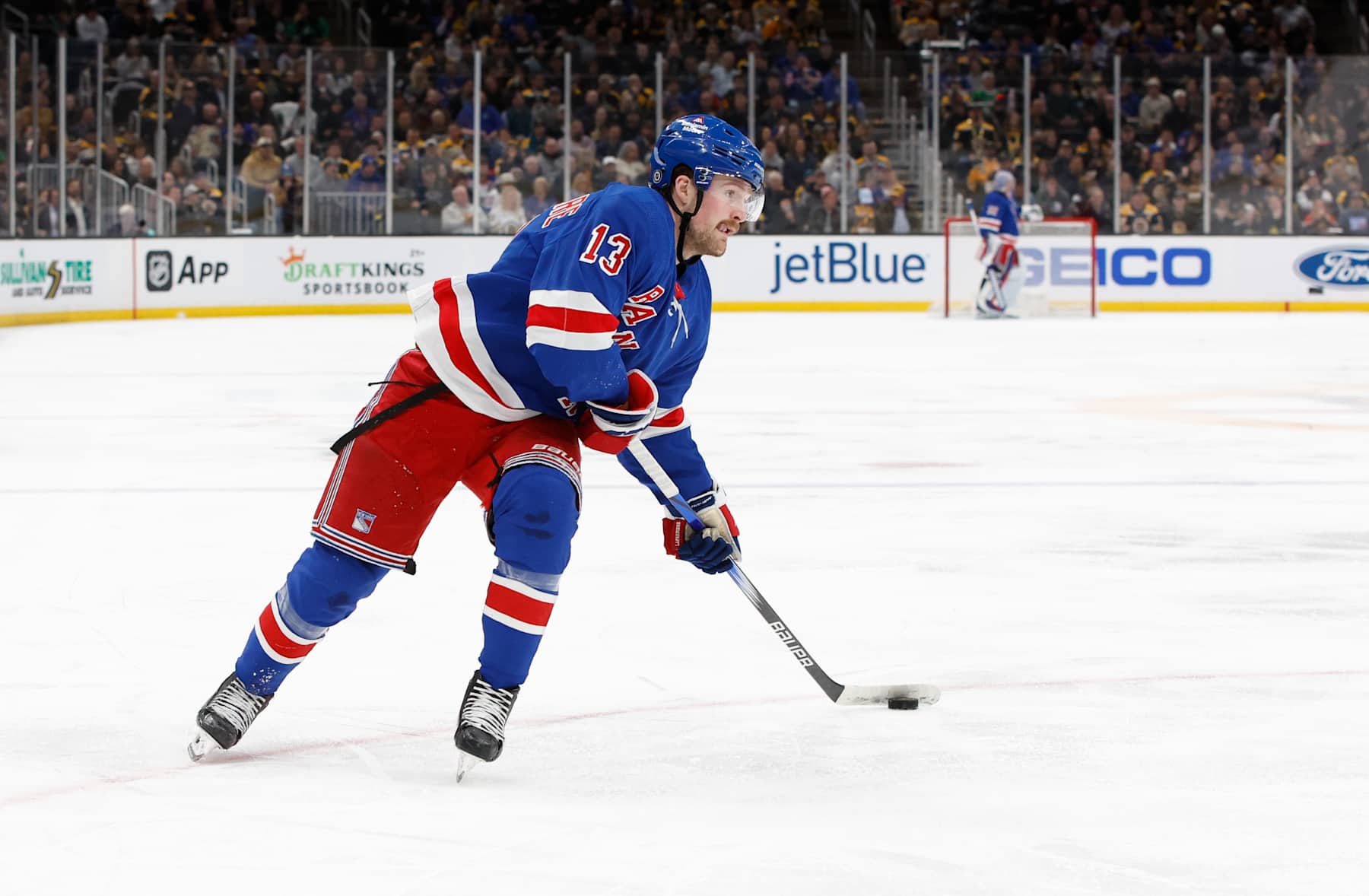 BOSTON, MASSACHUSETTS - MARCH 21: Alexis Lafreniere #13 of the New York Rangers skates against the Boston Bruins during the second period at the TD Garden on March 21, 2024 in Boston, Massachusetts. The Rangers won 5-2. (Photo by Richard T Gagnon/Getty Images)