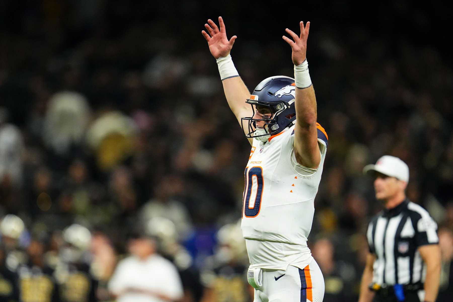 NEW ORLEANS, LA - OCTOBER 17: Bo Nix #10 of the Denver Broncos celebrates during an NFL football game against the New Orleans Saints at Caesars Superdome on October 17, 2024 in New Orleans, Louisiana. (Photo by Cooper Neill/Getty Images)