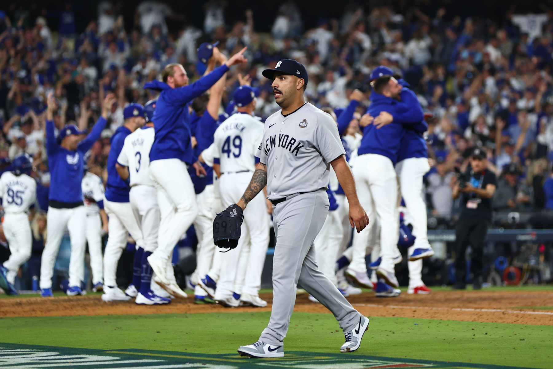 LOS ANGELES, CALIFORNIA - OCTOBER 25: Nestor Cortes #65 of the New York Yankees leaves the field after giving up a walk-off grand slam to Freddie Freeman #5 of the Los Angeles Dodgers in the tenth inning during Game One of the 2024 World Series at Dodger Stadium on October 25, 2024 in Los Angeles, California. (Photo by Maddie Meyer/Getty Images)