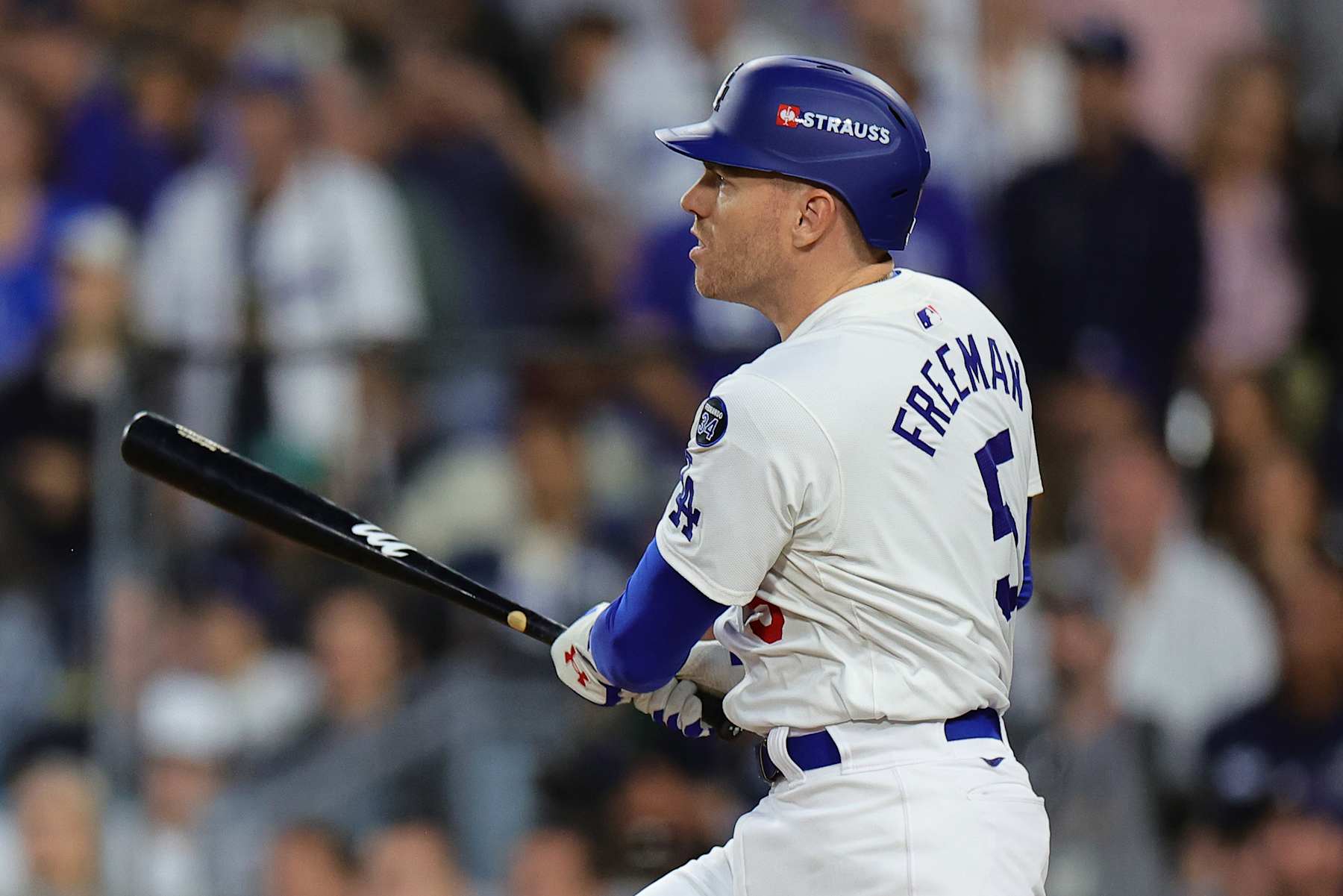 LOS ANGELES, CALIFORNIA - OCTOBER 26: Freddie Freeman #5 of the Los Angeles Dodgers hits a solo home run against the New York Yankees in the third inning during Game Two of the 2024 World Series at Dodger Stadium on October 26, 2024 in Los Angeles, California. (Photo by Alex Slitz/Getty Images)