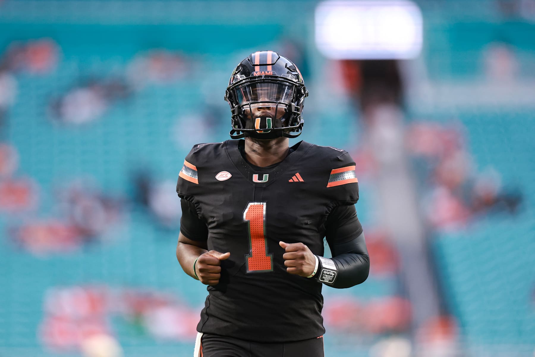 MIAMI GARDENS, FLORIDA - OCTOBER 26: Cam Ward #1 of the Miami Hurricanes warms up prior to facing the Florida State Seminoles at Hard Rock Stadium on October 26, 2024 in Miami Gardens, Florida. (Photo by Carmen Mandato/Getty Images)