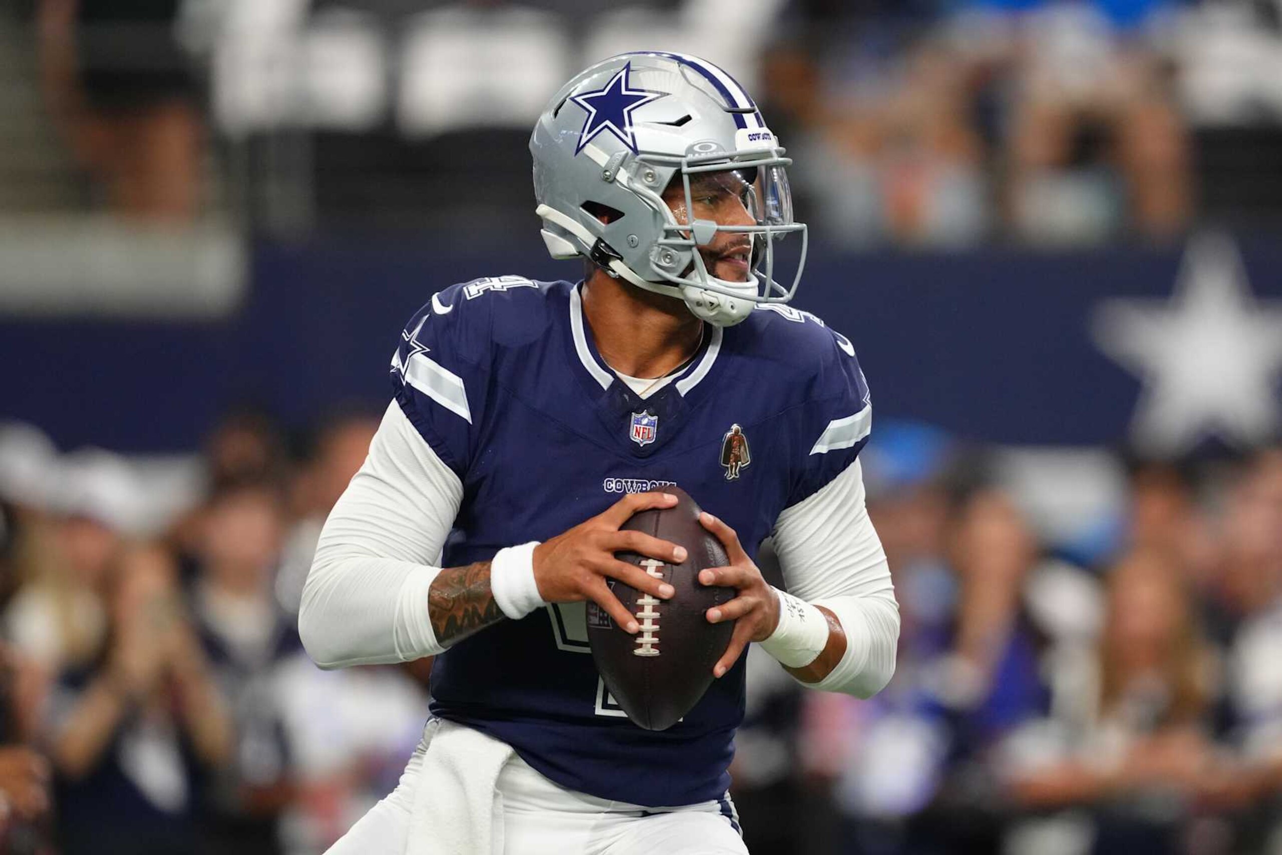 ARLINGTON, TEXAS - OCTOBER 13: Dak Prescott #4 of the Dallas Cowboys warms up before a game against the Detroit Lions at AT&T Stadium on October 13, 2024 in Arlington, Texas. (Photo by Sam Hodde/Getty Images)