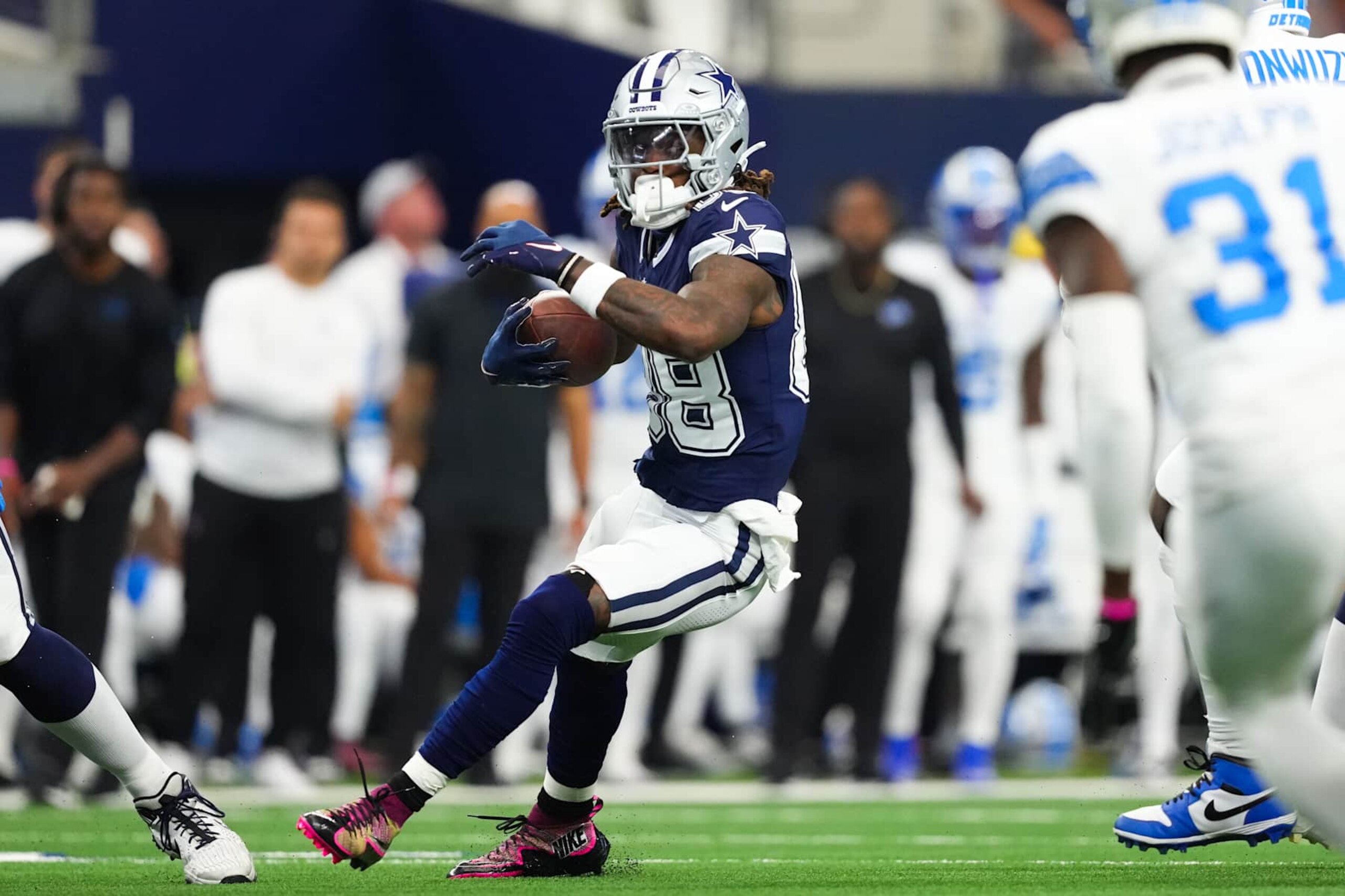 ARLINGTON, TEXAS - OCTOBER 13: CeeDee Lamb #88 of the Dallas Cowboys runs the ball up the field in the first quarter of a game against the Detroit Lions at AT&T Stadium on October 13, 2024 in Arlington, Texas. (Photo by Sam Hodde/Getty Images)