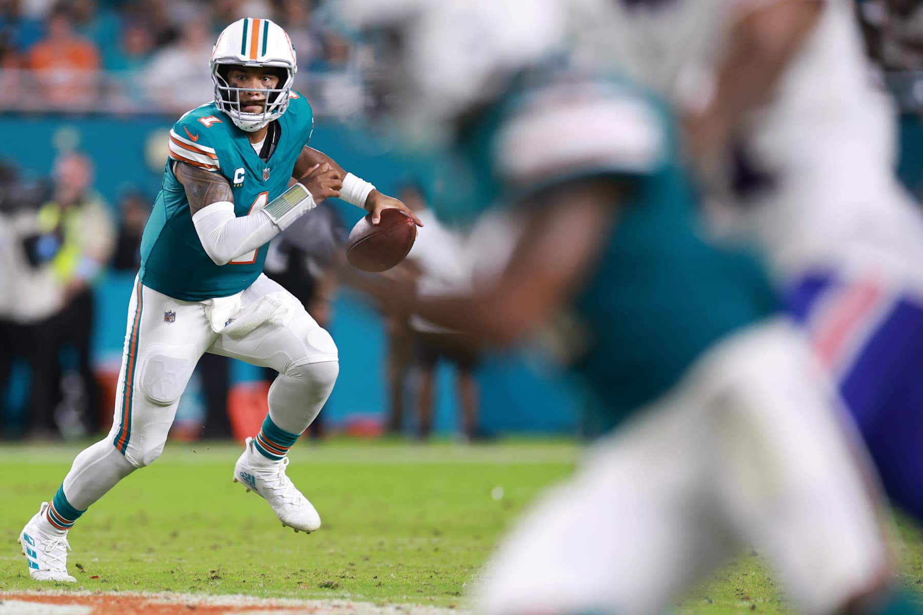 MIAMI GARDENS, FLORIDA - SEPTEMBER 12: Tua Tagovailoa #1 of the Miami Dolphins against the Buffalo Bills at Hard Rock Stadium on September 12, 2024 in Miami Gardens, Florida. (Photo by Carmen Mandato/Getty Images)