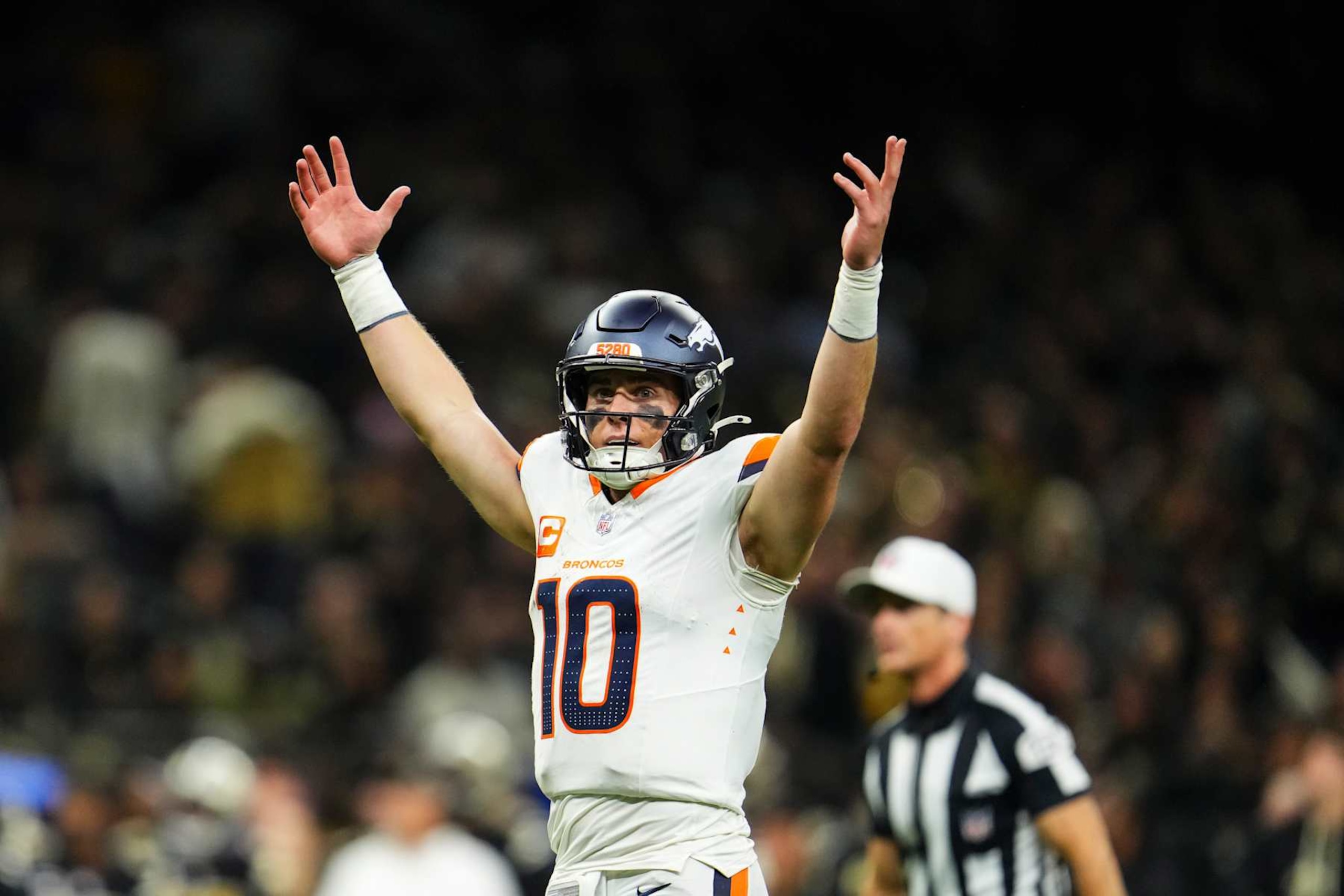 NEW ORLEANS, LA - OCTOBER 17: Bo Nix #10 of the Denver Broncos celebrates during an NFL football game against the New Orleans Saints at Caesars Superdome on October 17, 2024 in New Orleans, Louisiana. (Photo by Cooper Neill/Getty Images)