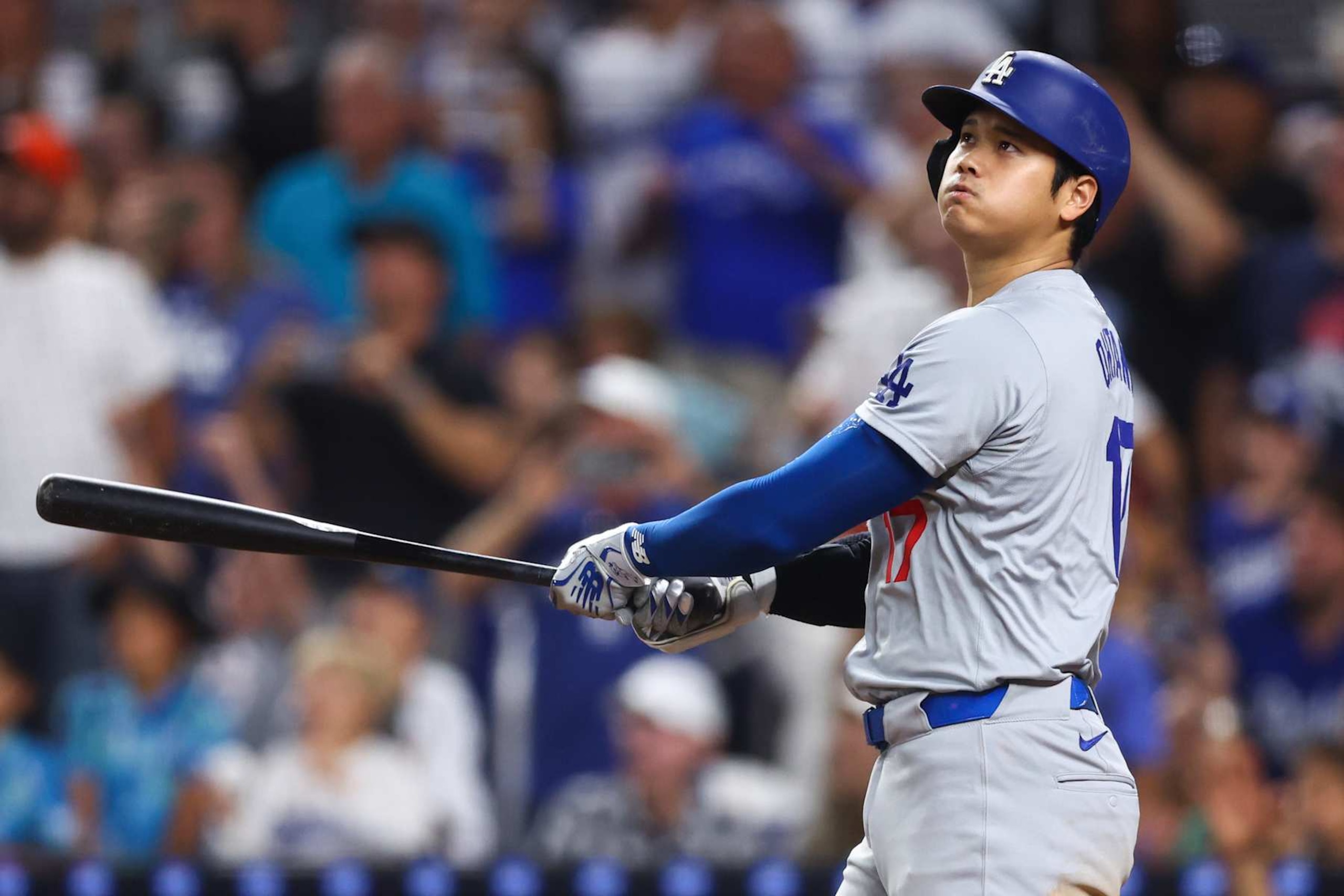 MIAMI, FLORIDA - SEPTEMBER 19: Shohei Ohtani #17 of the Los Angeles Dodgers hits a two-run home run, his 50th of the season, during the seventh inning against the Miami Marlins at loanDepot park on September 19, 2024 in Miami, Florida.  Ohtani is now the first MLB player to have at least 50 home runs and 50 stolen bases in the same season. (Photo by Megan Briggs/Getty Images)