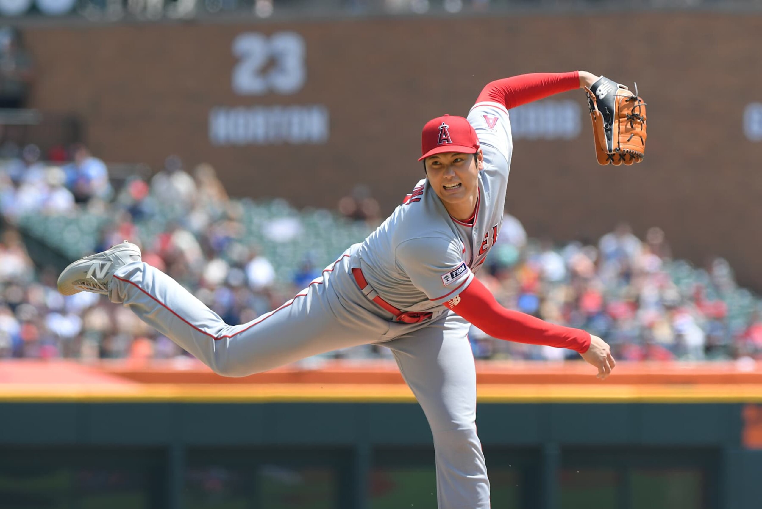 DETROIT, MI - JULY 27:  Shohei Ohtani #17 of the Los Angeles Angels pitches during the 4th inning of game one of a doubleheader against the Detroit Tigers at Comerica Park on July 27, 2023 in Detroit, Michigan. The Angels defeated the Tigers 6-0. Ohtani pitched a complete game, one-hit shutout.  (Photo by Mark Cunningham/MLB Photos via Getty Images)