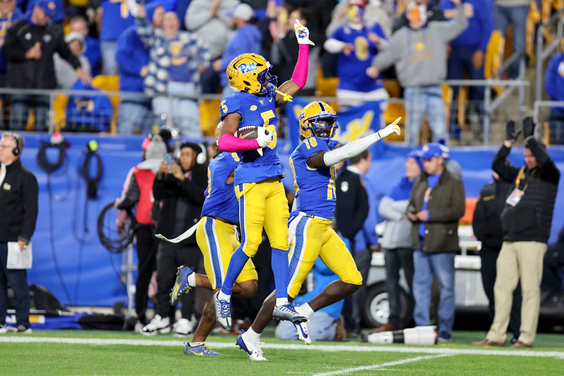 PITTSBURGH, PA - OCTOBER 24: Pittsburgh Panthers defensive back Phillip O'Brien Jr. (5) and Pittsburgh Panthers defensive back Tamarion Crumpley (18) celebrate after O'Brien Jr. intercepted a pass during the third quarter of the college football game between the Syracuse Orange and Pittsburgh Panthers on October 24, 2024, at Acrisure Stadium in Pittsburgh, PA. (Photo by Frank Jansky/Icon Sportswire via Getty Images)