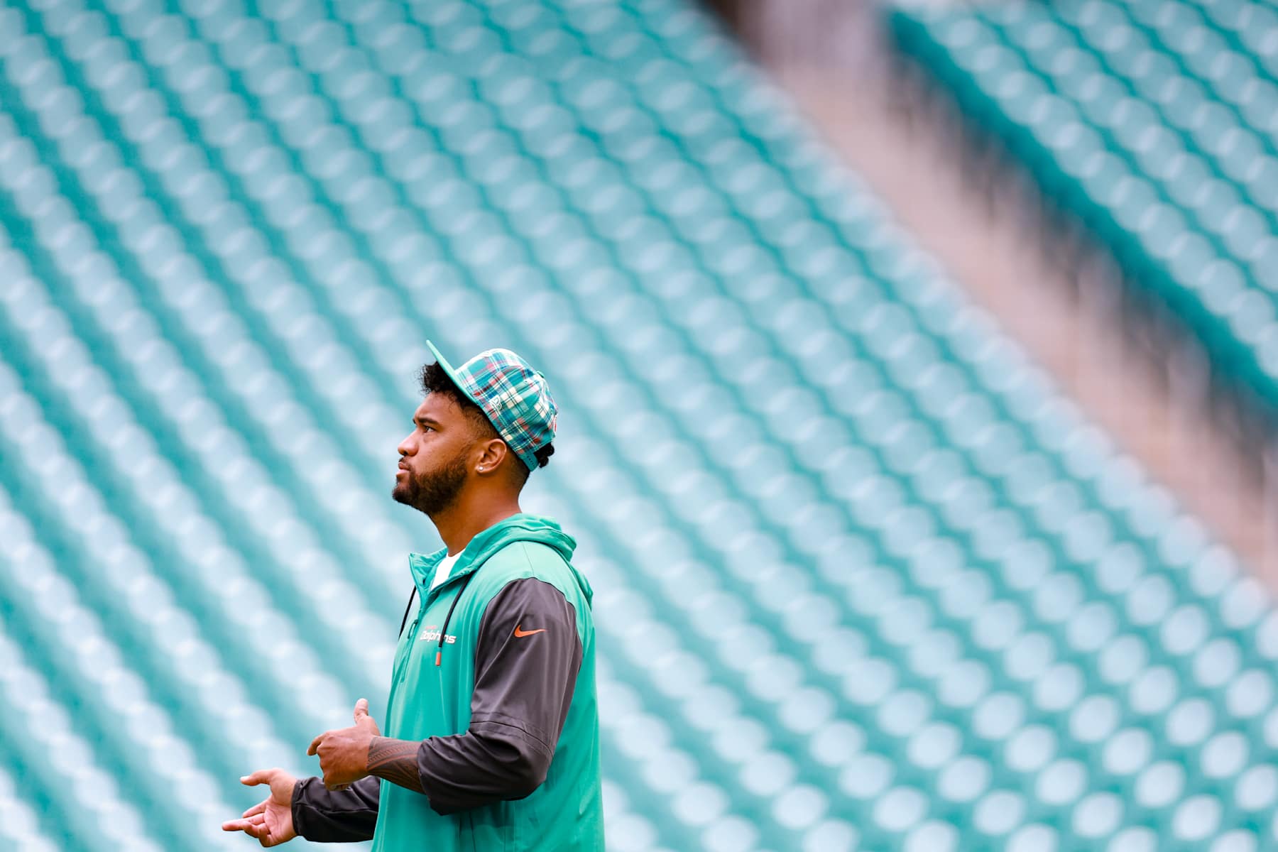 MIAMI GARDENS, FLORIDA - OCTOBER 27: Tua Tagovailoa #1 of the Miami Dolphins warms up prior to facing the Arizona Cardinals at Hard Rock Stadium on October 27, 2024 in Miami Gardens, Florida. (Photo by Carmen Mandato/Getty Images)