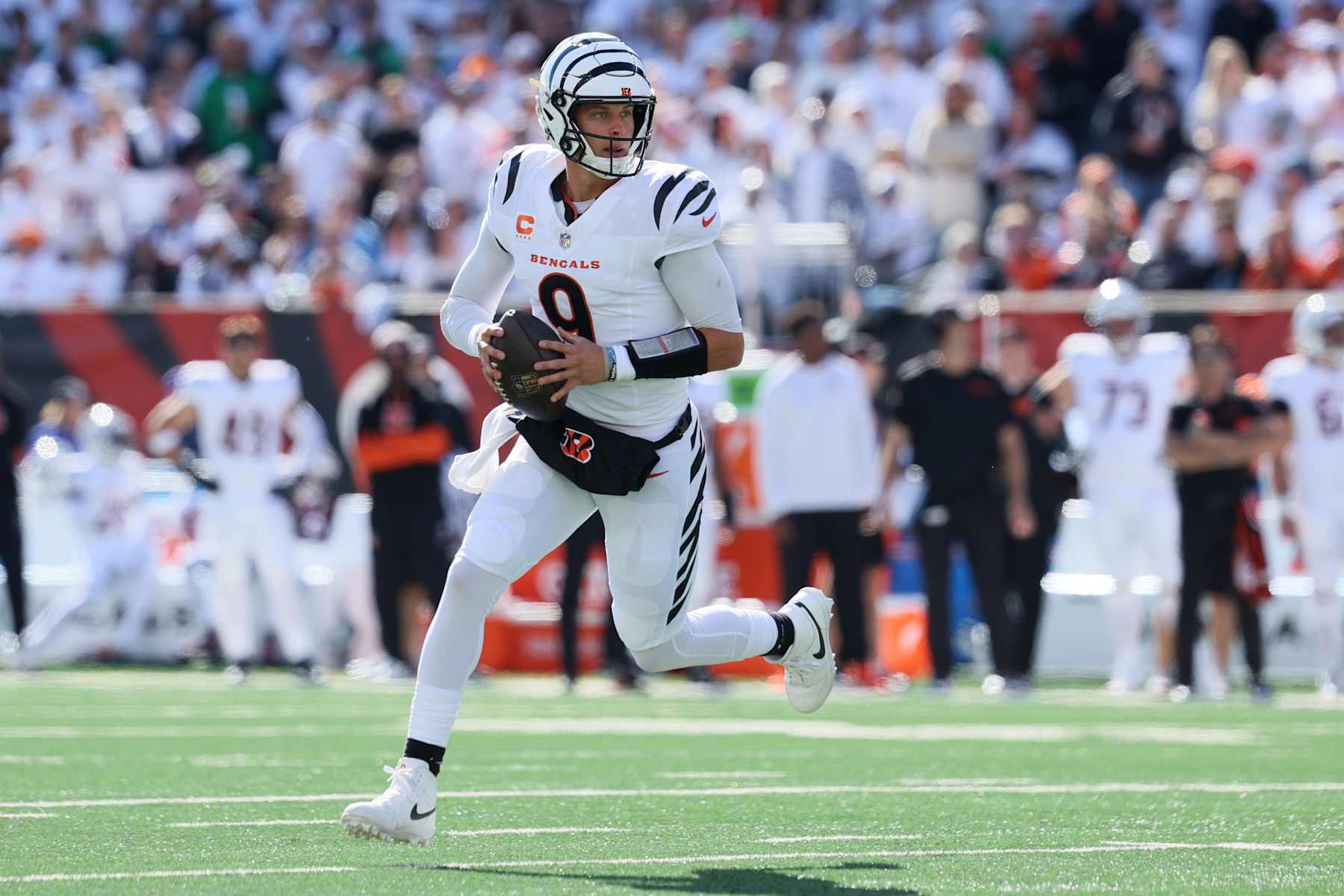 CINCINNATI, OHIO - OCTOBER 27: Joe Burrow #9 of the Cincinnati Bengals runs with the ball during the first quarter against the Philadelphia Eagles at Paycor Stadium on October 27, 2024 in Cincinnati, Ohio. (Photo by Andy Lyons/Getty Images)