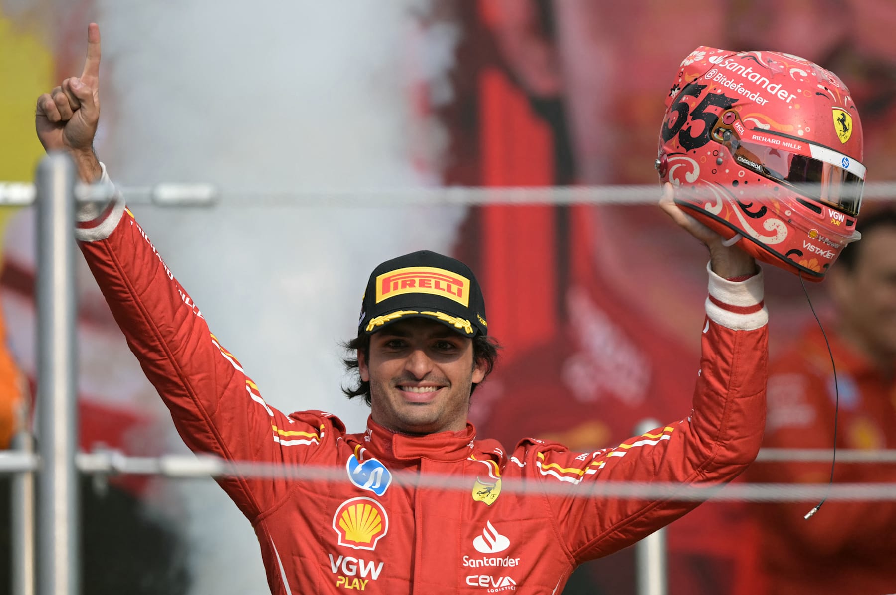 Ferrari's Spanish driver Carlos Sainz celebrates in the podium after winning the Mexico City Formula One Grand Prix at the Hermanos Rodriguez racetrack, in Mexico City on October 27, 2024. (Photo by YURI CORTEZ / AFP) (Photo by YURI CORTEZ/AFP via Getty Images)