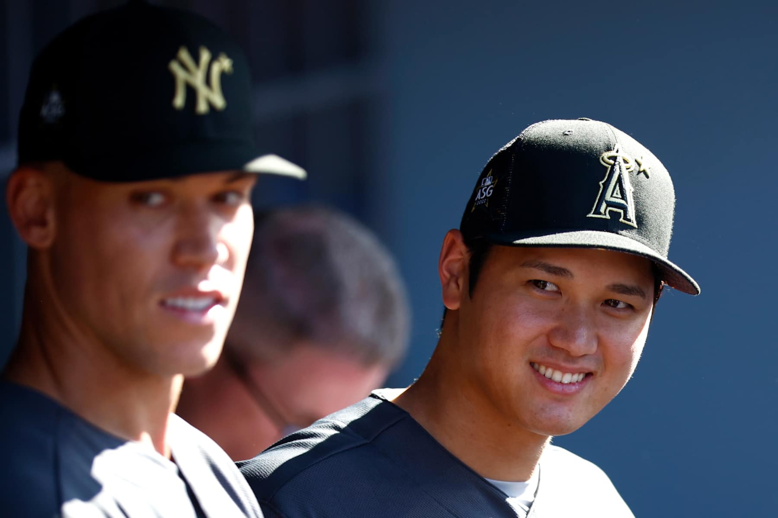 LOS ANGELES, CALIFORNIA - JULY 19: Aaron Judge #99 of the New York Yankees and Shohei Ohtani #17 of the Los Angeles Angels look on from the dugout before the 92nd MLB All-Star Game presented by Mastercard at Dodger Stadium on July 19, 2022 in Los Angeles, California. (Photo by Ronald Martinez/Getty Images)