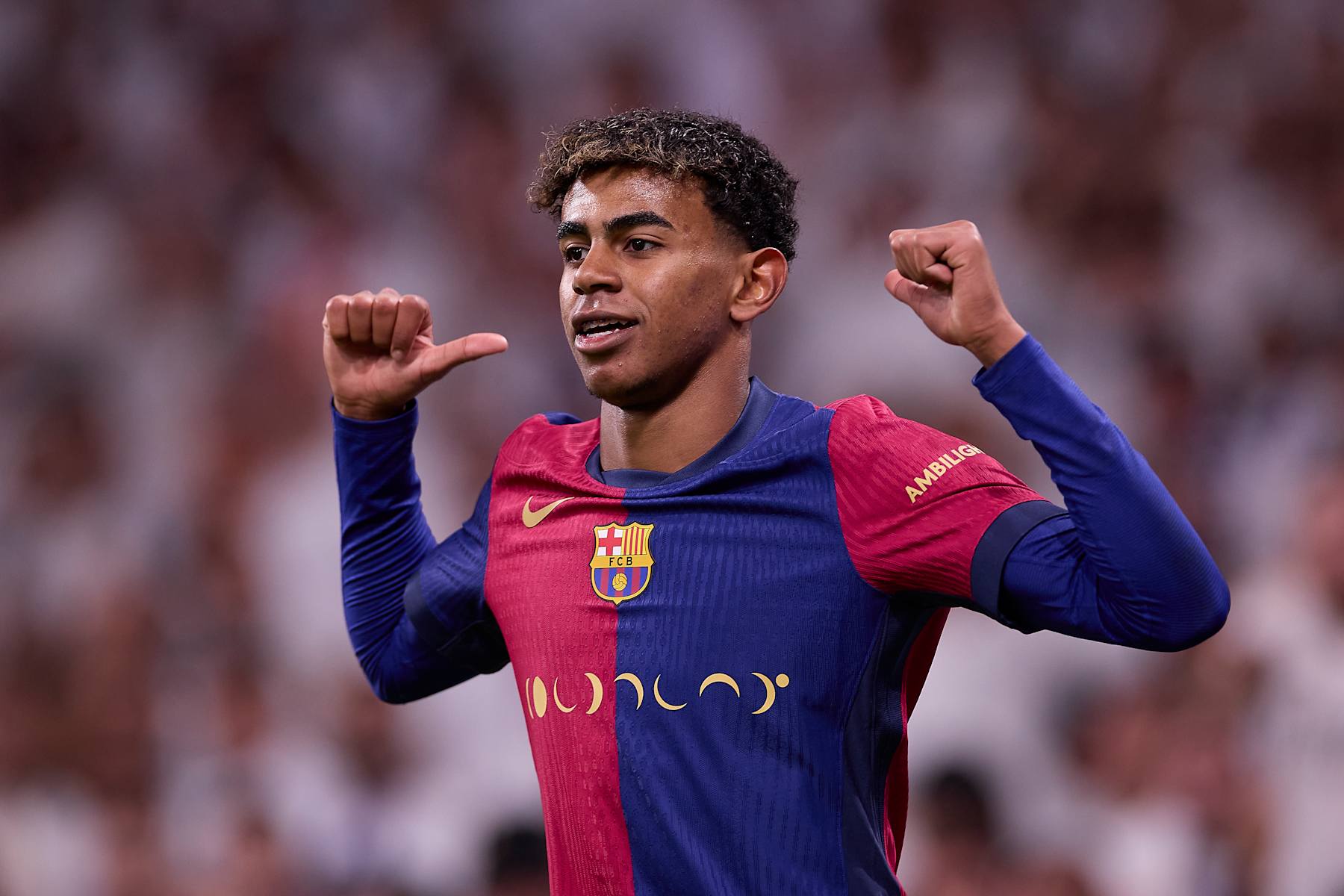 MADRID, SPAIN - 2024/10/26: Lamine Yamal of FC Barcelona celebrates a goal during the 2024/2025 La Liga EA Sports week 11 football match between Real Madrid CF and FC Barcelona at Santiago Bernabeu stadium. Final score: Real Madrid CF 0 : 4 FC Barcelona. (Photo by Federico Titone/SOPA Images/LightRocket via Getty Images)