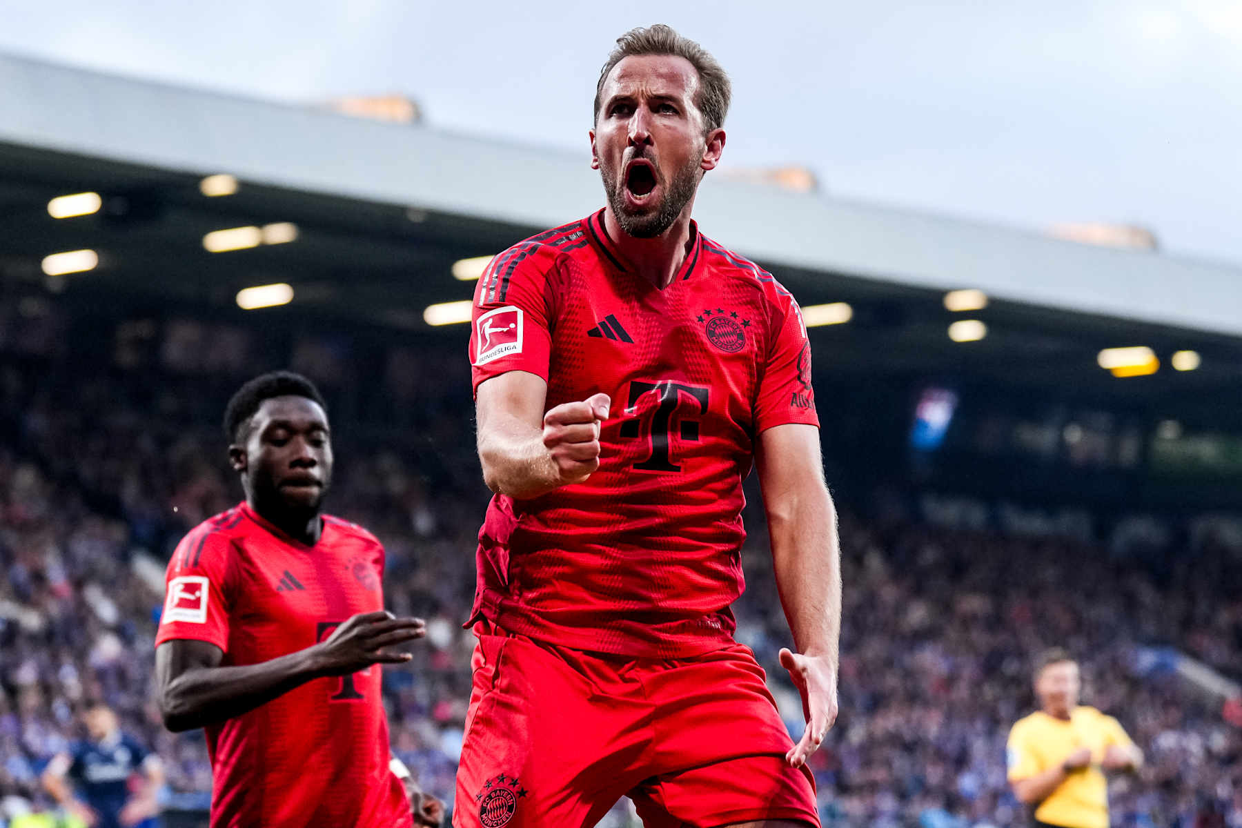 BOCHUM, GERMANY - OCTOBER 27: Harry Kane of FC Bayern Munchen celebrates after scoring his team's third goal during the Bundesliga match between VfL Bochum 1848 and FC Bayern Munchen at Vonovia Ruhrstadion on October 27, 2024 in Bochum, Germany. (Photo by Rene Nijhuis/MB Media/Getty Images)