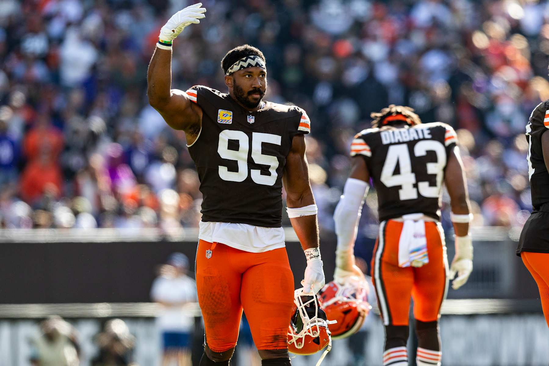 CLEVELAND, OHIO - OCTOBER 27: Myles Garrett #95 of the Cleveland Browns waves to the crowd during the third quarter of the game against the Baltimore Ravens at Huntington Bank Field on October 27, 2024 in Cleveland, Ohio. The Browns beat the Ravens 29-24. (Photo by Lauren Leigh Bacho/Getty Images)
