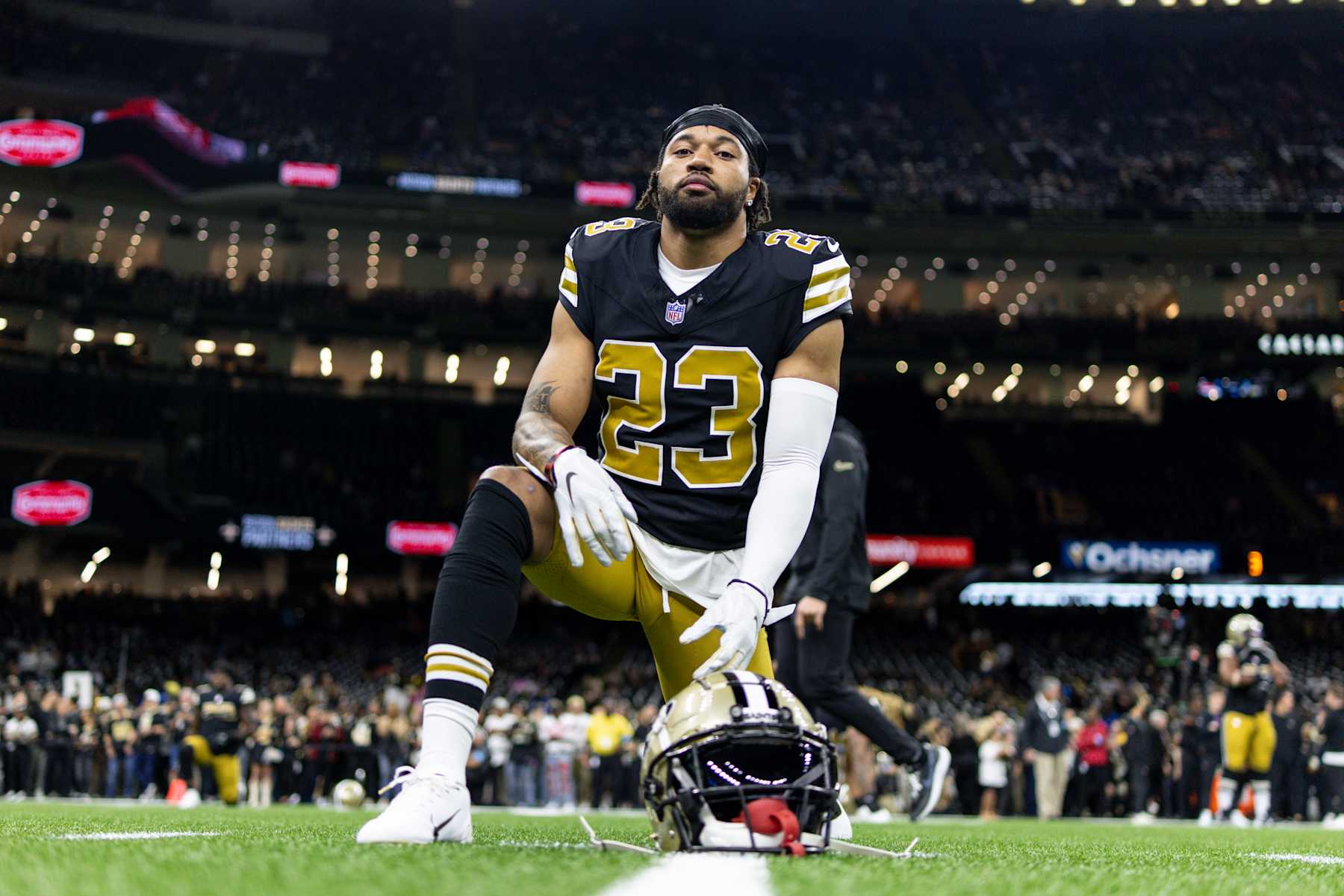 NEW ORLEANS, LOUSIANA - OCTOBER 17: Marshon Lattimore #23 of the New Orleans looks on as he stretches prior to an NFL Football game against the Denver Broncos at Caesars Superdome on October 17, 2024 in New Orleans, Lousiana. (Photo by Michael Owens/Getty Images)