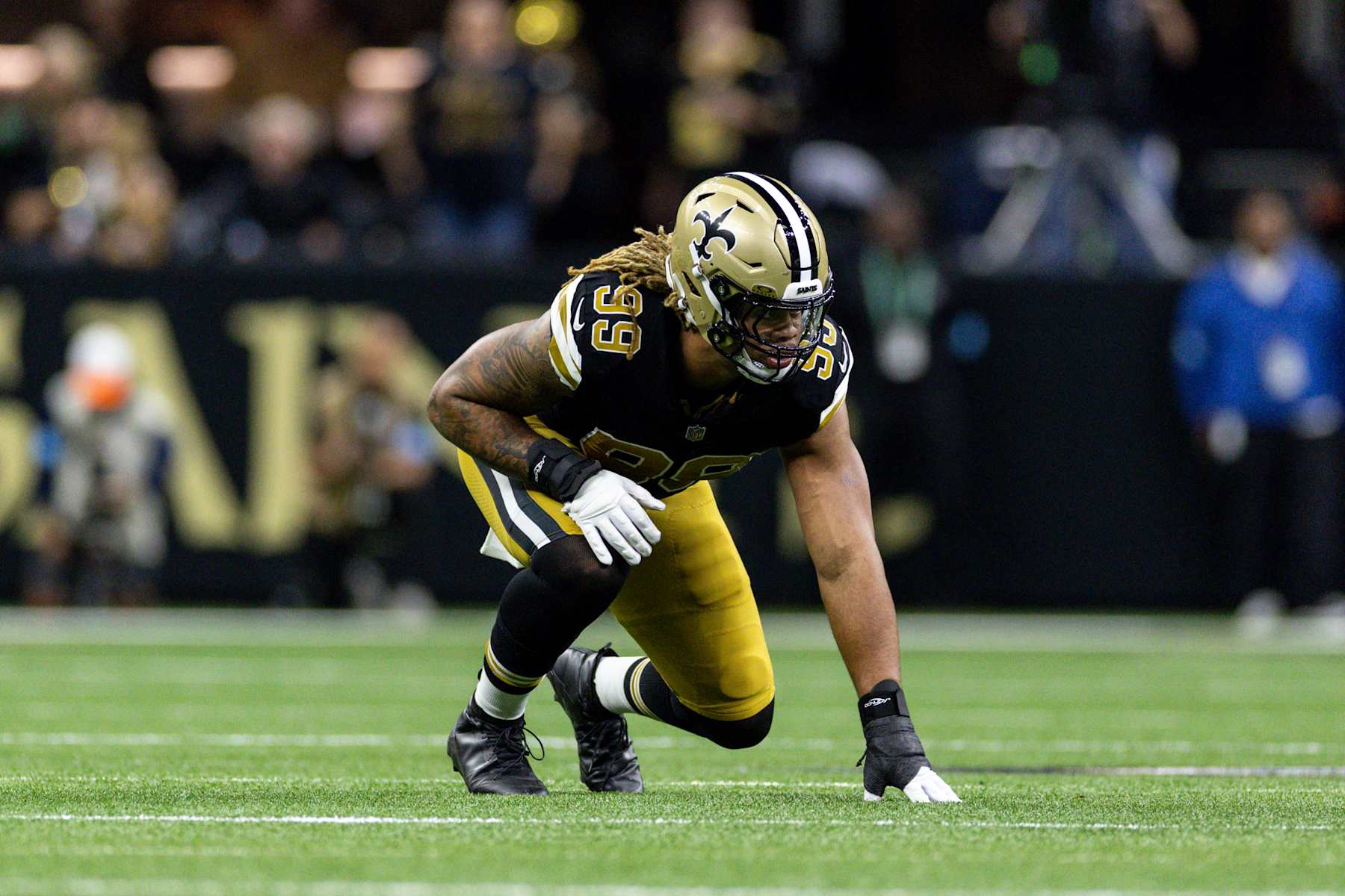 NEW ORLEANS, LOUSIANA - OCTOBER 17: Chase Young #99 of the New Orleans lines up during an NFL Football game against the Denver Broncos at Caesars Superdome on October 17, 2024 in New Orleans, Lousiana. (Photo by Michael Owens/Getty Images)