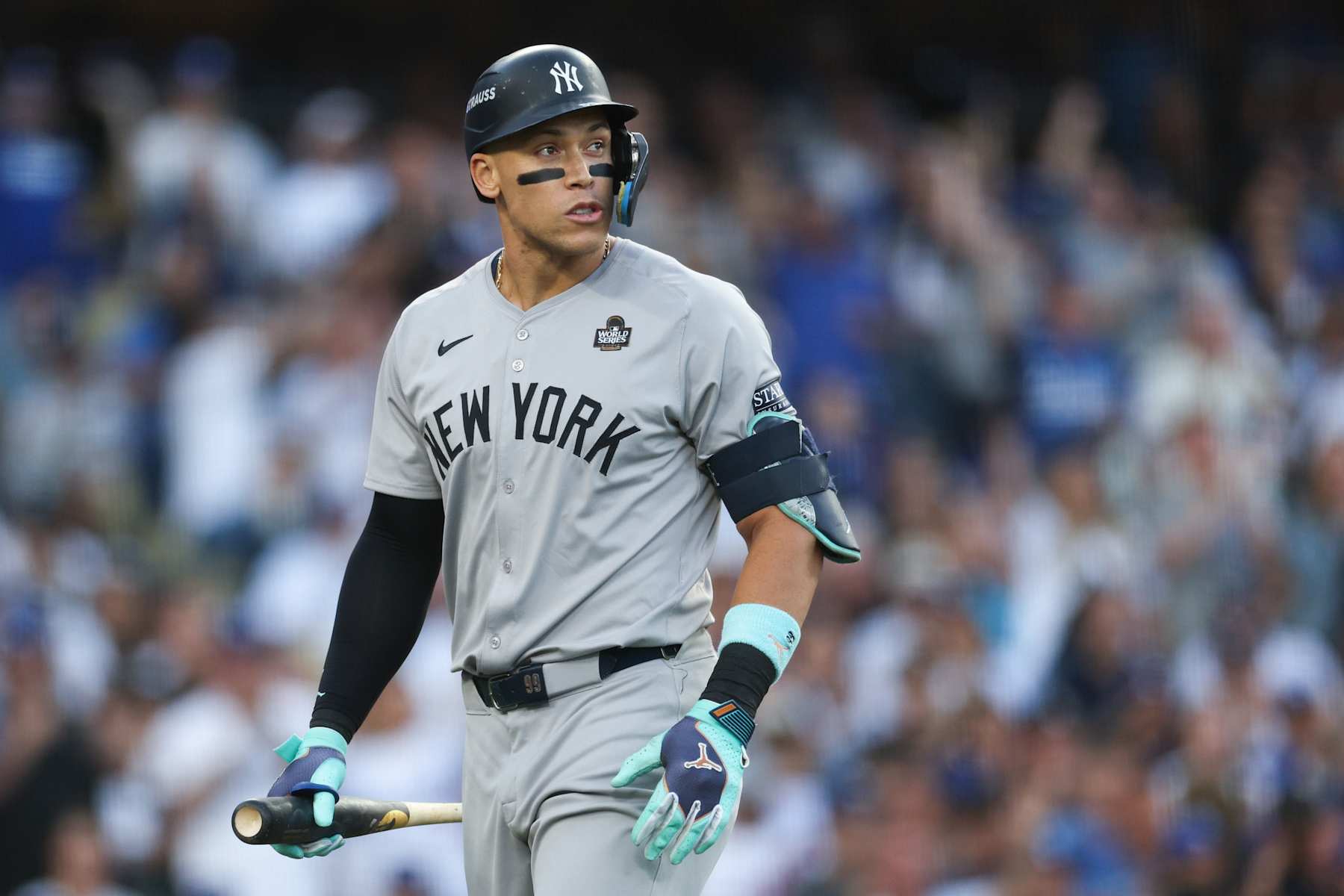 LOS ANGELES, CALIFORNIA - OCTOBER 26: Aaron Judge #99 of the New York Yankees reacts after striking out off a pitch from Yoshinobu Yamamoto #18 (not pictured) of the Los Angeles Dodgers in the first inning during Game Two of the 2024 World Series at Dodger Stadium on October 26, 2024 in Los Angeles, California. (Photo by Harry How/Getty Images)