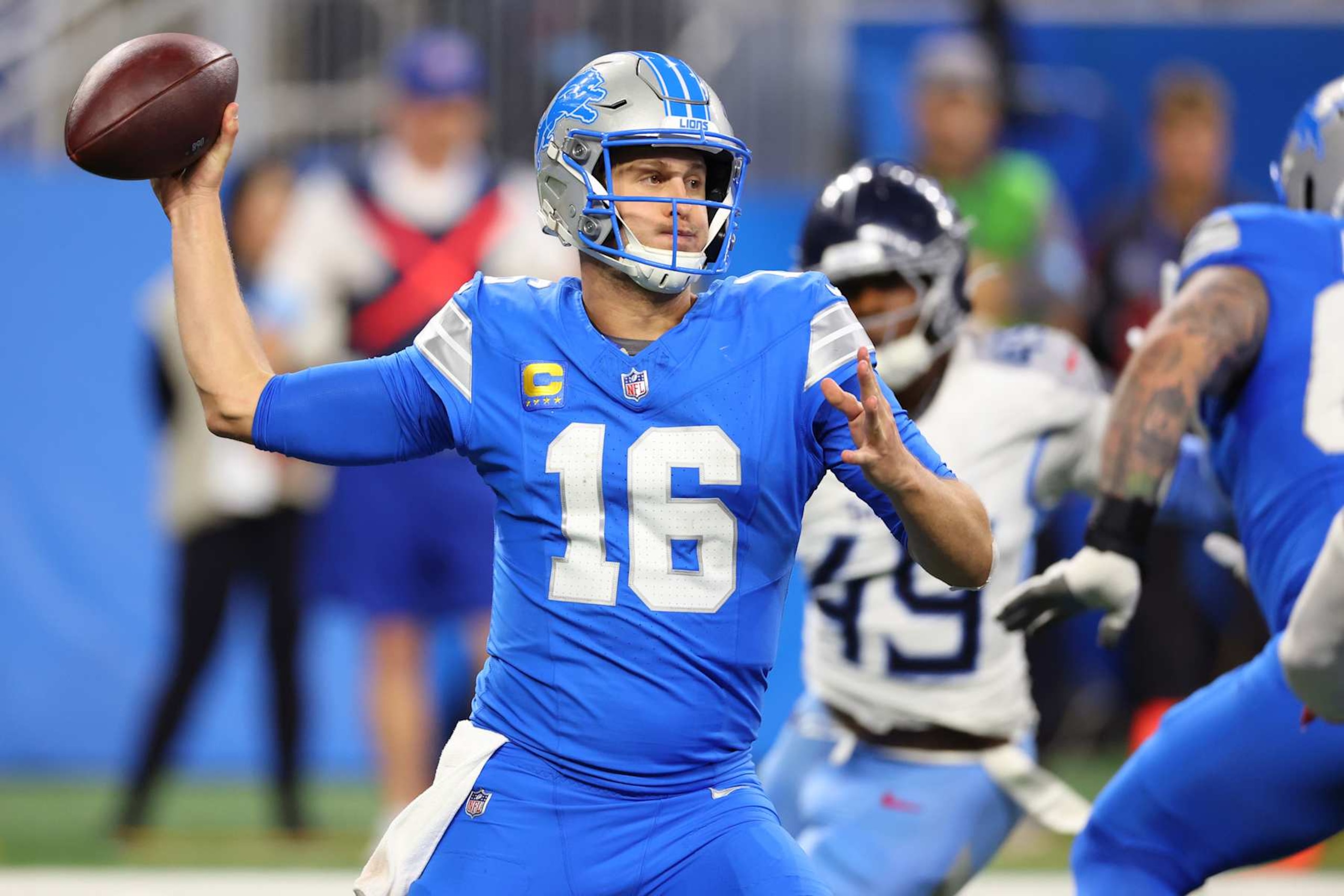 DETROIT, MICHIGAN - OCTOBER 27: Jared Goff #16 of the Detroit Lions looks to pass in the third quarter of a game against the Tennessee Titans at Ford Field on October 27, 2024 in Detroit, Michigan. (Photo by Gregory Shamus/Getty Images) DETROIT, MICHIGAN - OCTOBER 27: Jared Goff #16 of the Detroit Lions looks to pass in the third quarter of a game against the Tennessee Titans at Ford Field on October 27, 2024 in Detroit, Michigan. (Photo by Gregory Shamus/Getty Images)