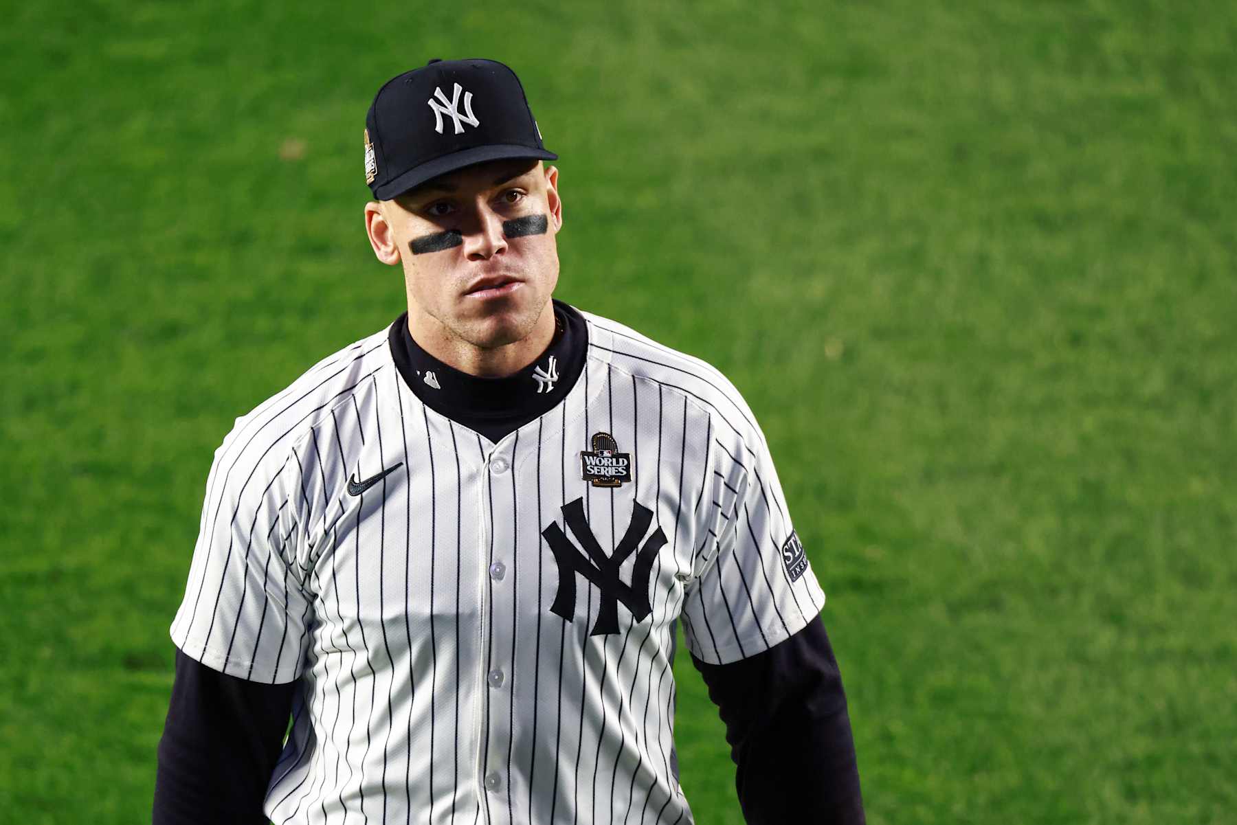 NEW YORK, NY - OCTOBER 28: Aaron Judge #99 of the New York Yankees looks on during Game 3 of the 2024 World Series presented by Capital One between the Los Angeles Dodgers and the New York Yankees at Yankee Stadium on Monday, October 28, 2024 in New York, New York. (Photo by Dustin Satloff/MLB Photos via Getty Images)