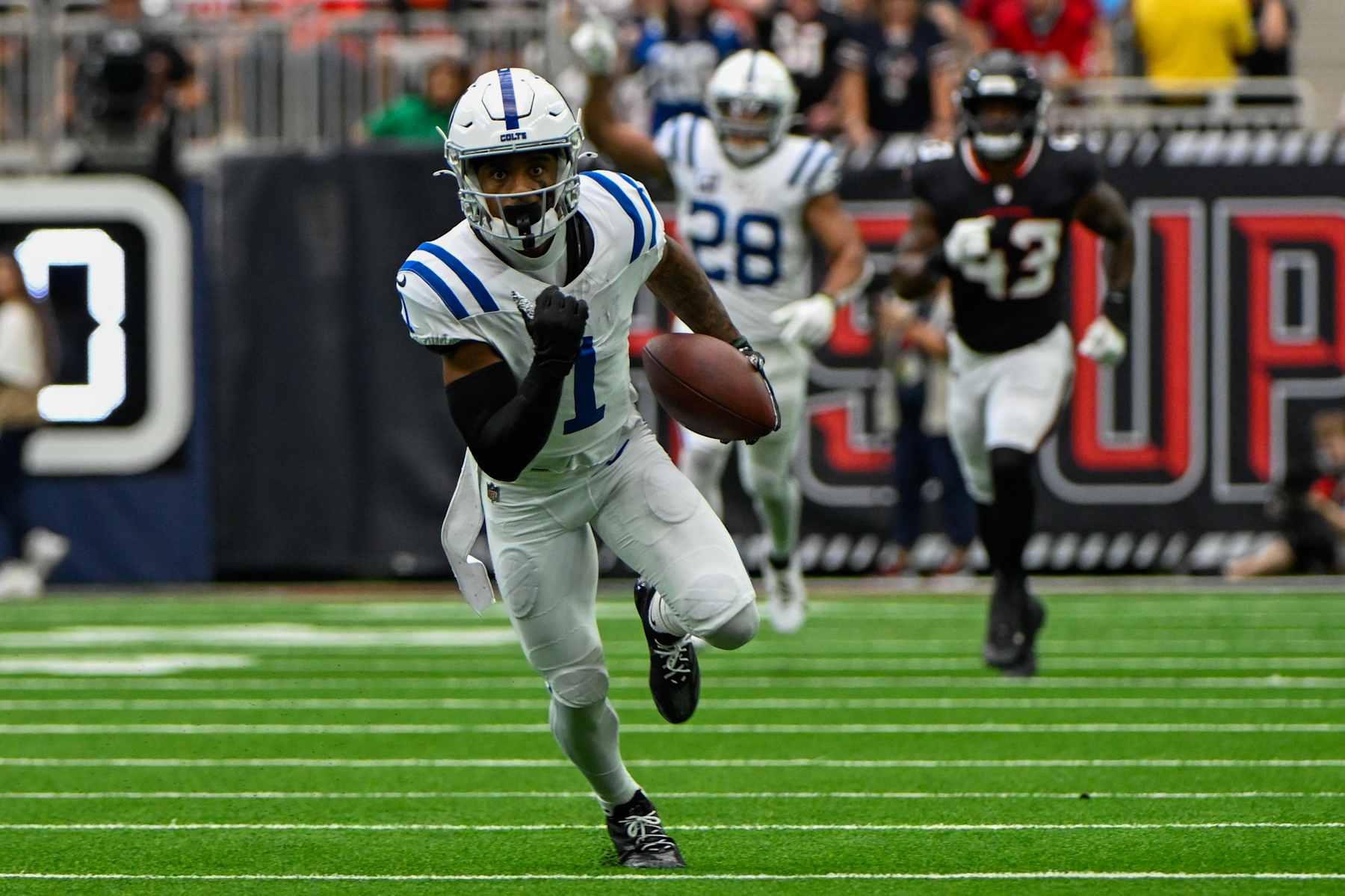 HOUSTON, TX - OCTOBER 27: Indianapolis Colts wide receiver Josh Downs (1) finds open field after a pass reception during the football game between the Indianapolis Colts and Houston Texans on October 27, 2024 at NRG Stadium in Houston, Texas. (Photo by Ken Murray/Icon Sportswire via Getty Images)