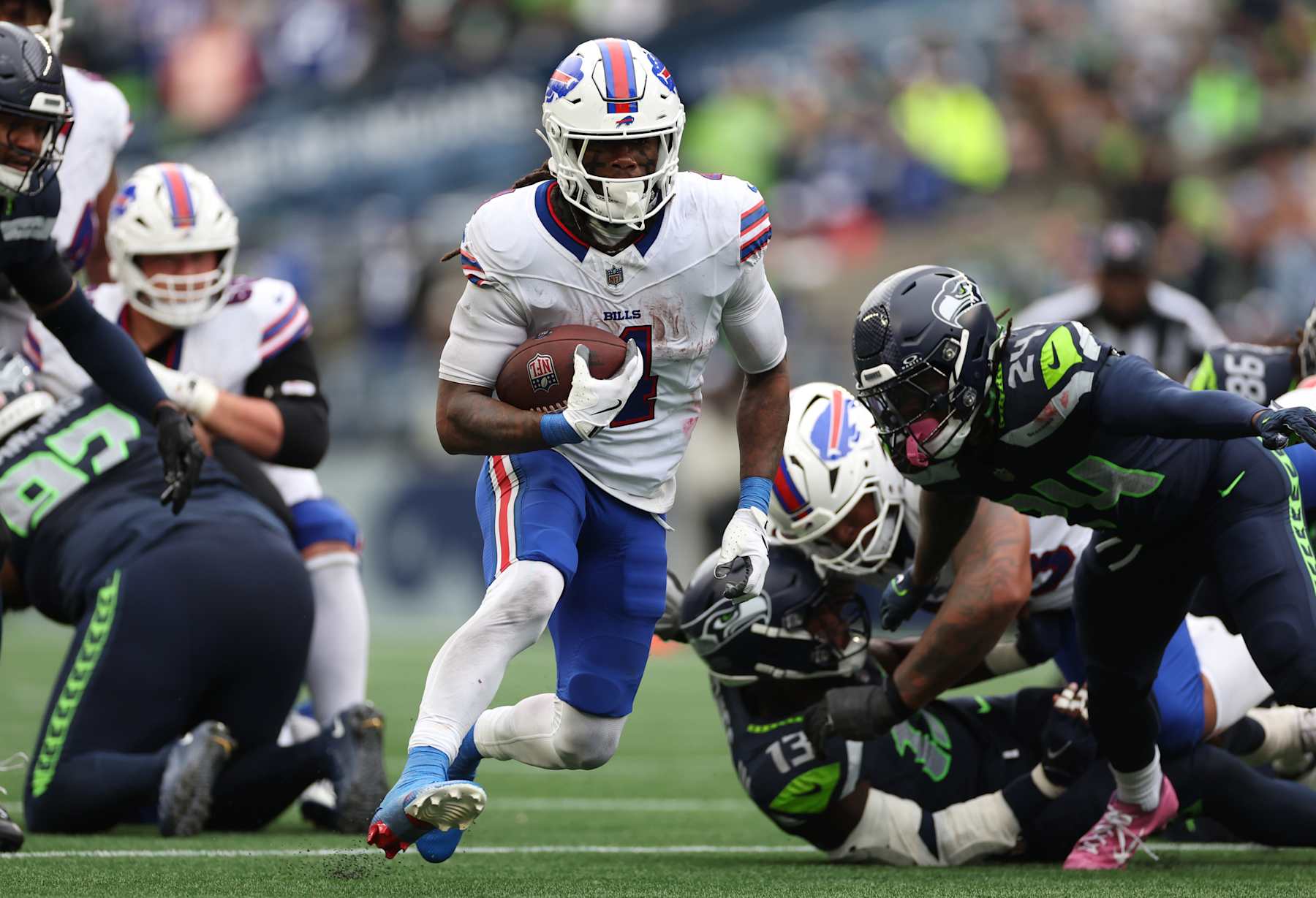 SEATTLE, WASHINGTON - OCTOBER 27: James Cook #4 of the Buffalo Bills carries the ball during the third quarter against the Seattle Seahawks at Lumen Field on October 27, 2024 in Seattle, Washington. (Photo by Steph Chambers/Getty Images)