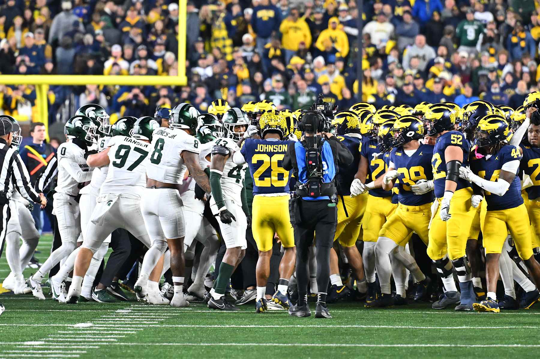 ANN ARBOR, MI - OCTOBER 26: The Michigan Wolverines and Michigan State Spartans come together in a fight at the end of the game during the Michigan Wolverines versus the Michigan State Spartans game on Saturday October 26, 2024 at Michigan Stadium in Ann Arbor, MI. (Photo by Steven King/Icon Sportswire via Getty Images)