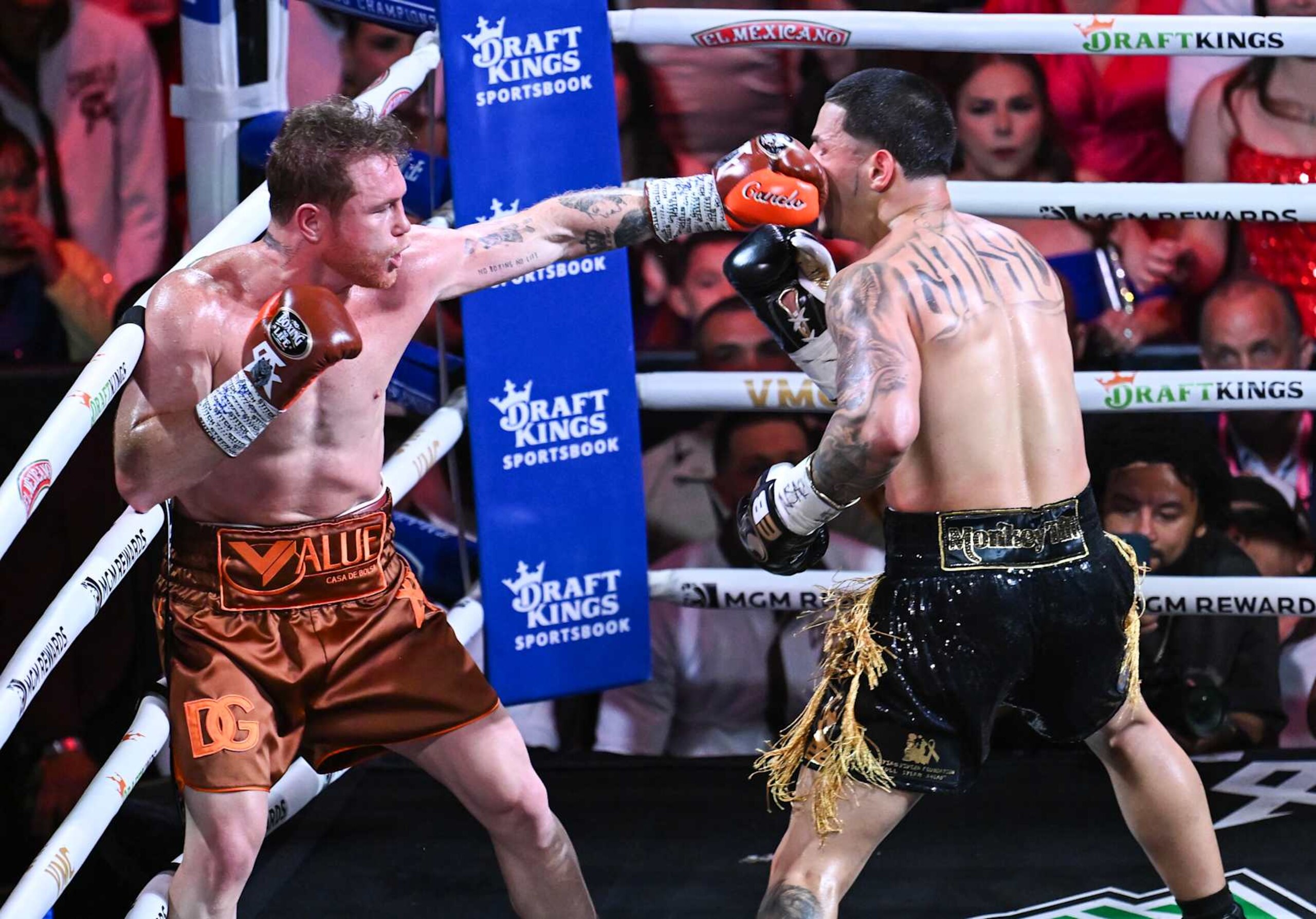 LAS VEGAS, NEVADA - SEPTEMBER 14: Saul 'Canelo' Alvarez (in brown short) from Guadalajara, Mexico and Edgar Berlanga (in black&gold short) from Brooklyn, New York exchange punches during their super middleweight world titles of the Premiere Boxing Championship on Saturday night at the T-Mobile Arena in Las Vegas, Nevada, United States on September 14, 2024. (Photo by Tayfun Coskun/Anadolu via Getty Images)