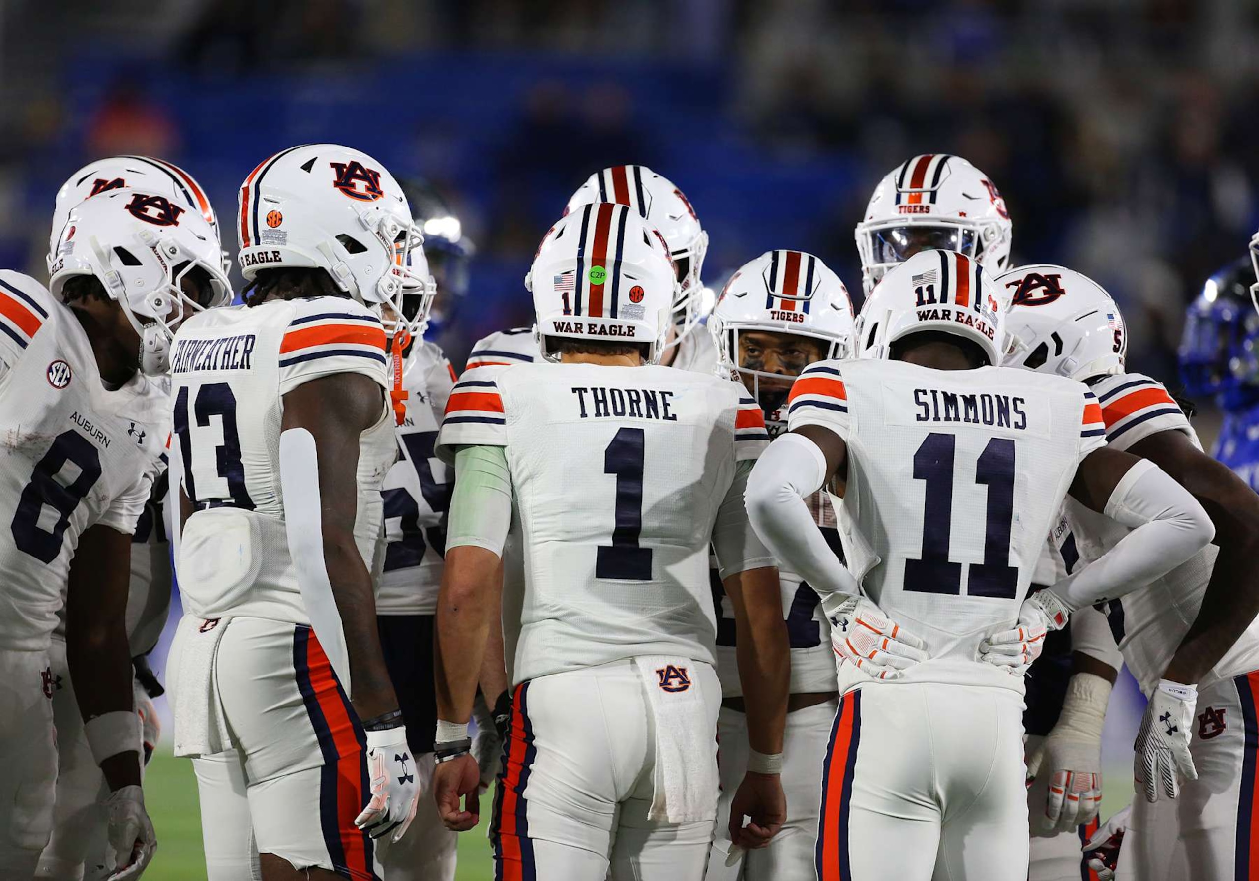 LEXINGTON, KY - OCTOBER 26: Auburn Tigers quarterback Payton Thorne (1) leads his team in a huddle in a game between the Kentucky Wildcats and the Auburn Tigers on October 26, 2024, at Kroger Field in Lexington, KY. (Photo by Jeff Moreland/Icon Sportswire via Getty Images) LEXINGTON, KY - OCTOBER 26: Auburn Tigers quarterback Payton Thorne (1) leads his team in a huddle in a game between the Kentucky Wildcats and the Auburn Tigers on October 26, 2024, at Kroger Field in Lexington, KY. (Photo by Jeff Moreland/Icon Sportswire via Getty Images)